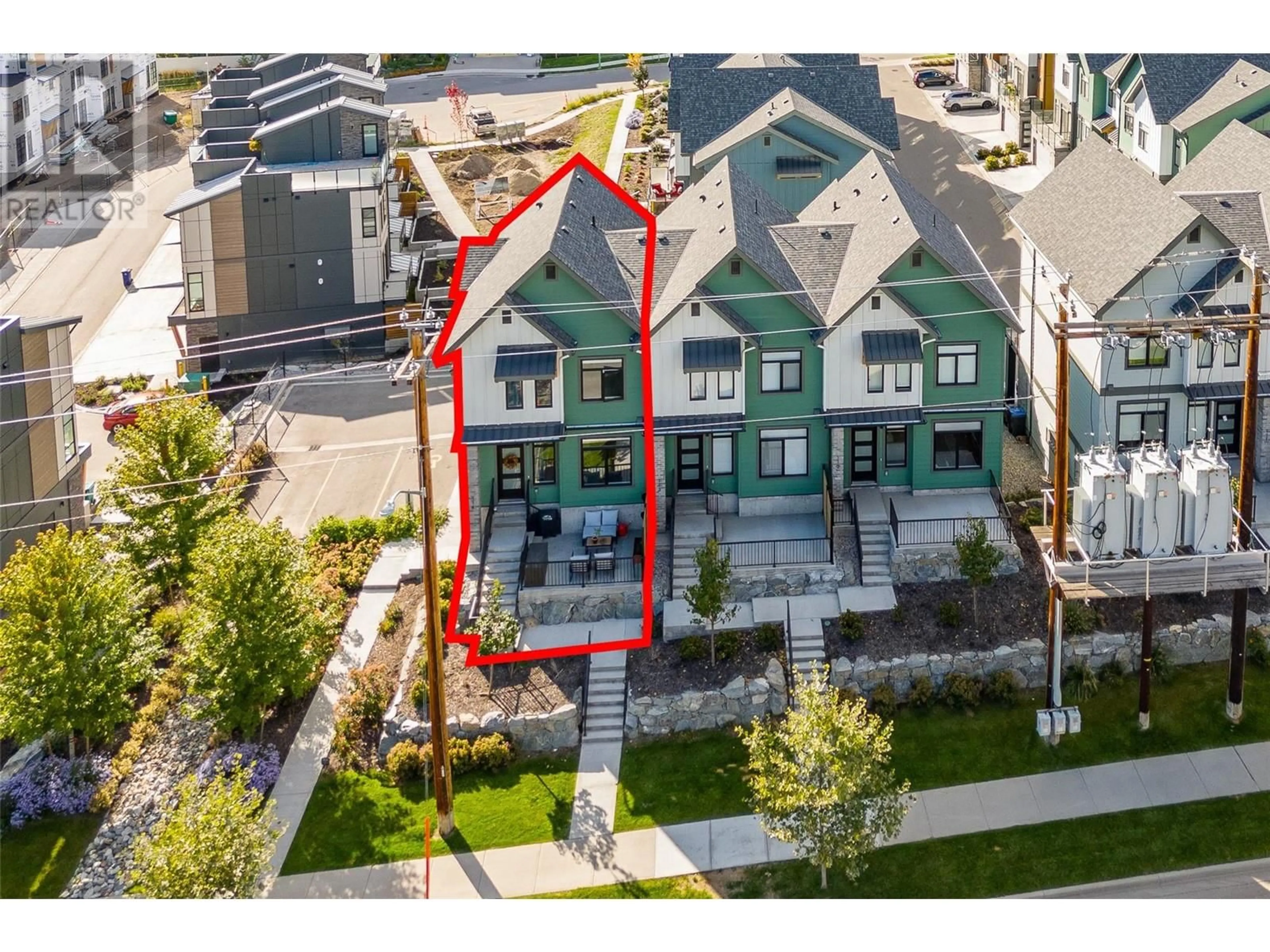 A pic from outside/outdoor area/front of a property/back of a property/a pic from drone, street for 1435 Cara Glen Court Unit# 114, Kelowna British Columbia V1V0G1