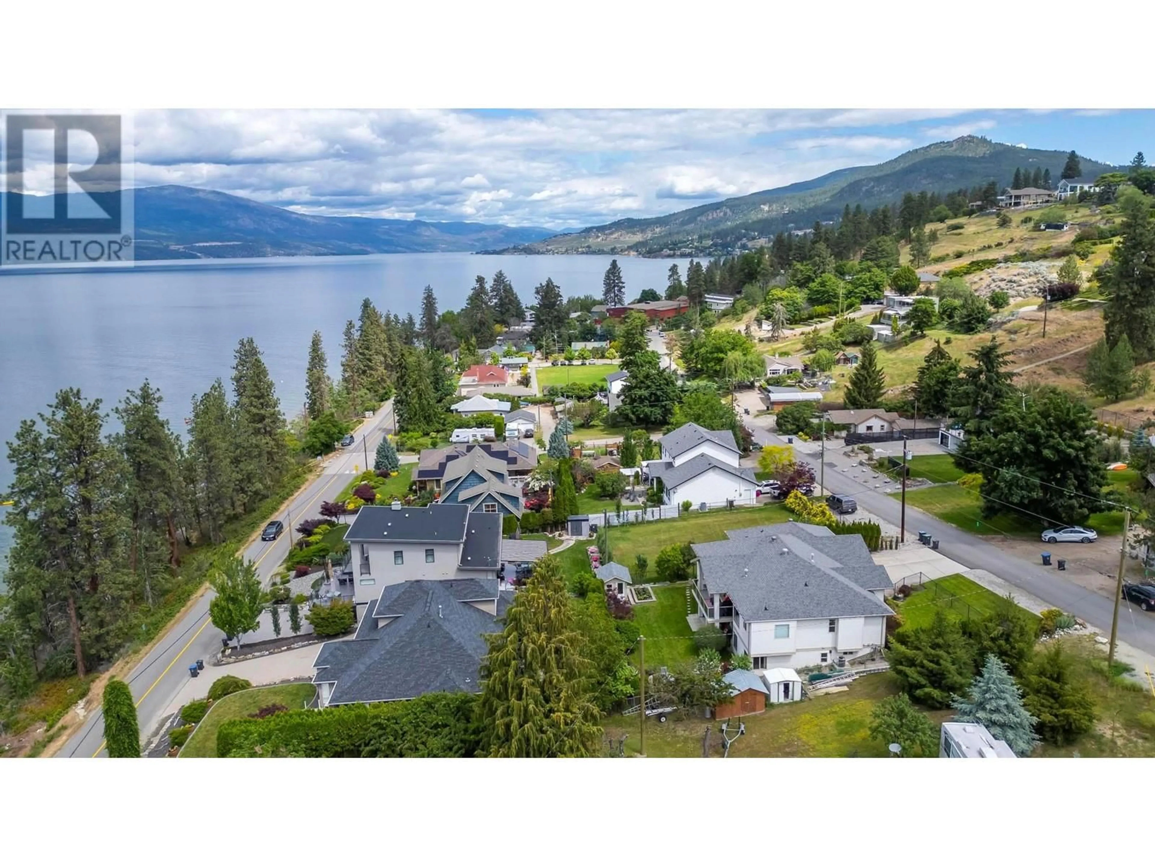 A pic from outside/outdoor area/front of a property/back of a property/a pic from drone, water/lake/river/ocean view for 11150 Maddock Avenue, Lake Country British Columbia V4V2J7