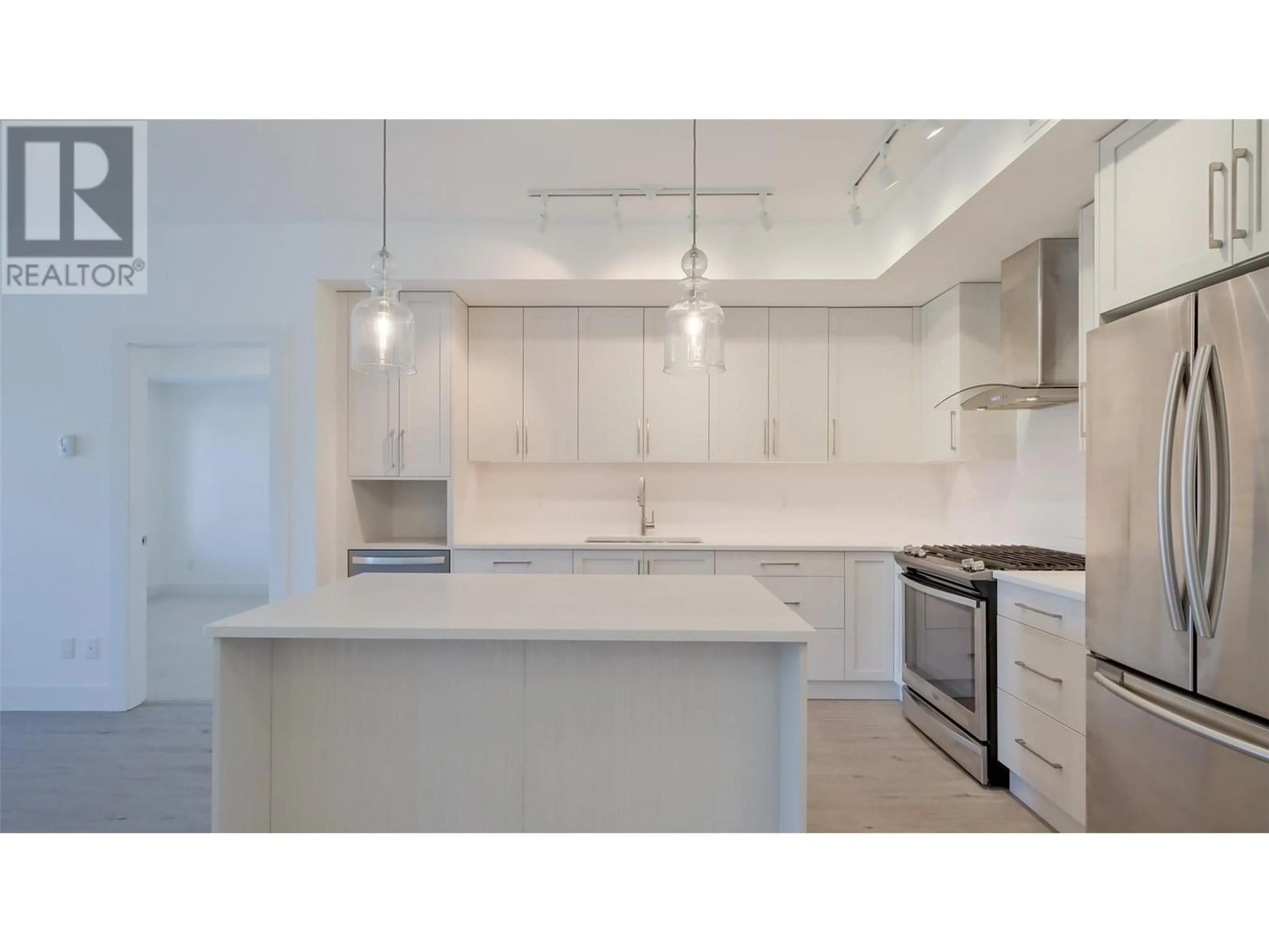 Open concept kitchen, ceramic/tile floor for 4380 Lakeshore Road Unit# 209, Kelowna British Columbia V1W5N3