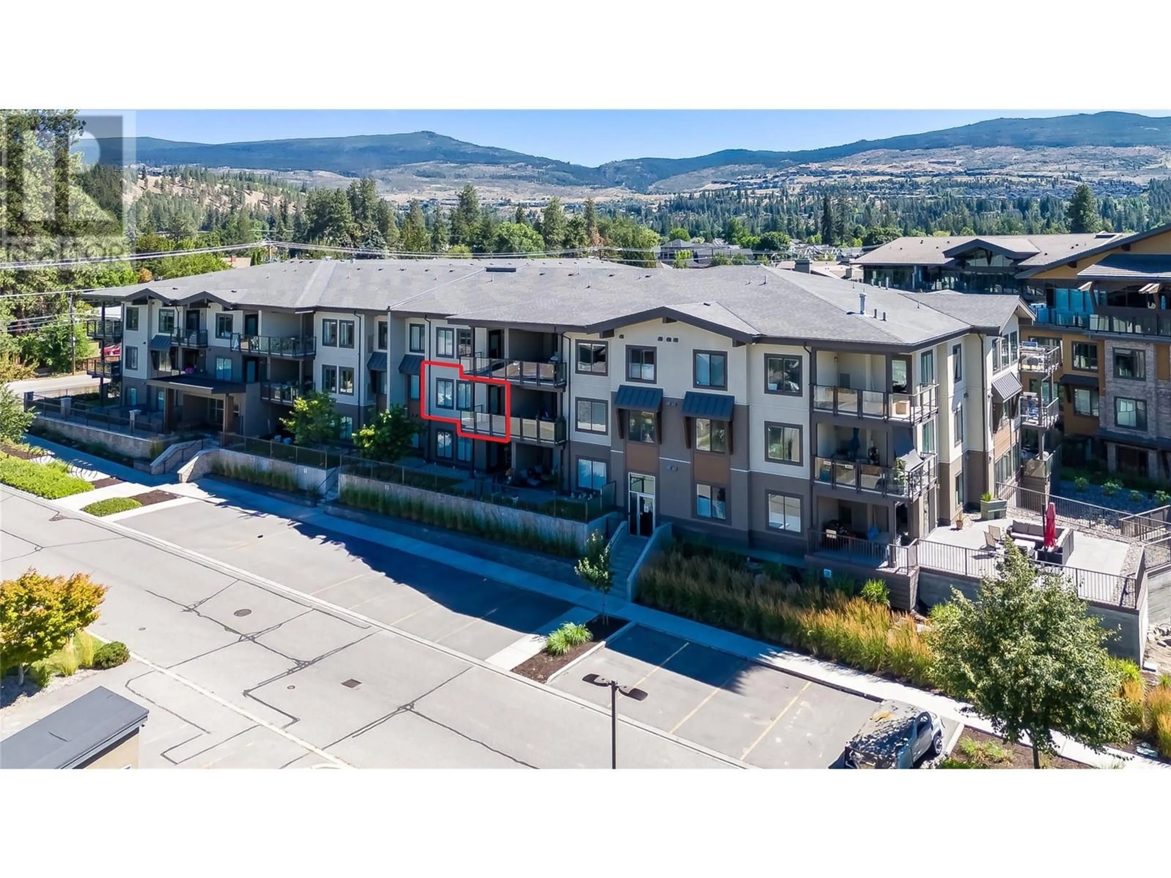 A pic from outside/outdoor area/front of a property/back of a property/a pic from drone, mountain view for 4380 Lakeshore Road Unit# 209, Kelowna British Columbia V1W5N3