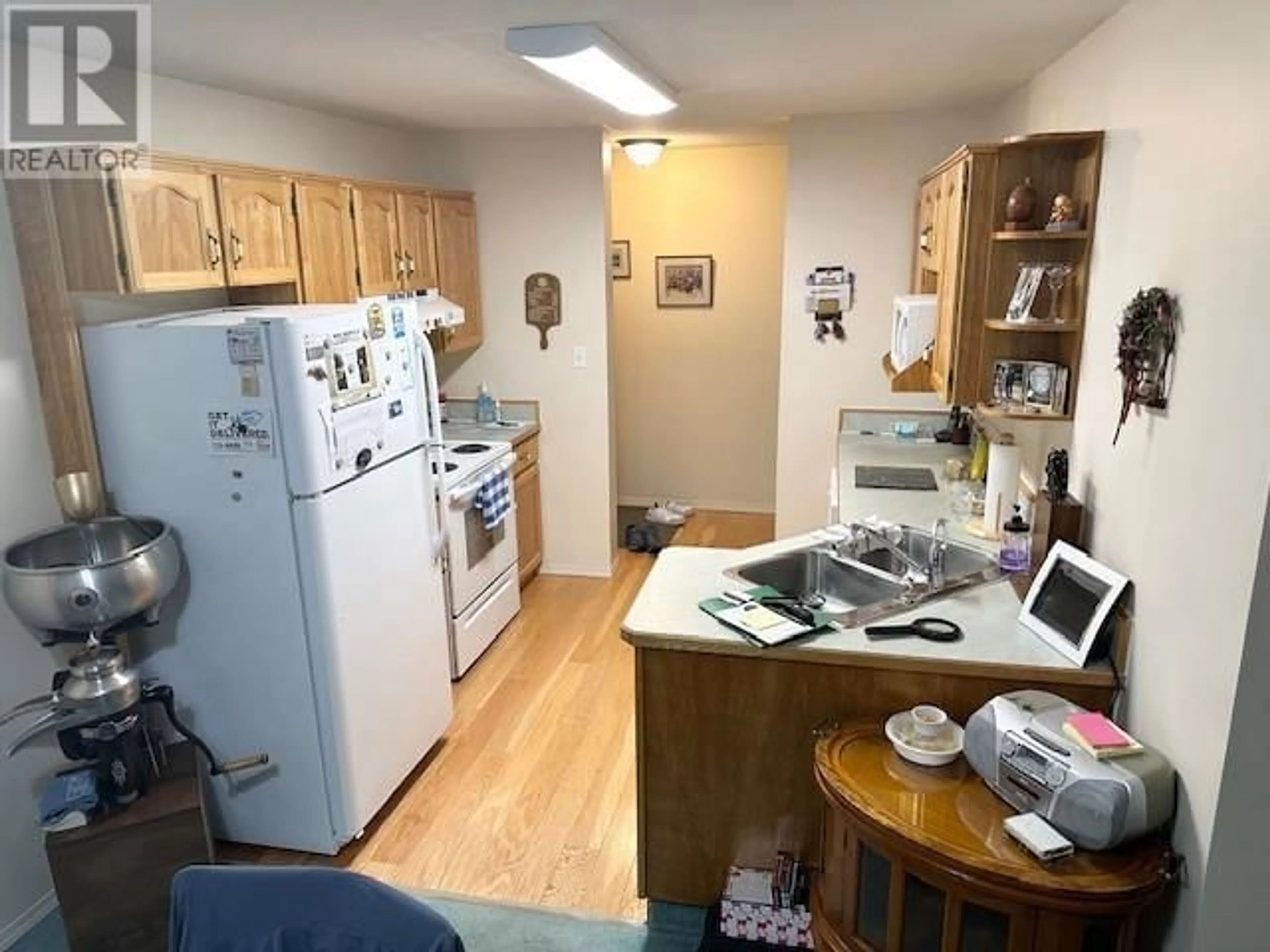 Standard kitchen, unknown for 3426 Hemlock Street Unit# 102, Penticton British Columbia V2A8K1