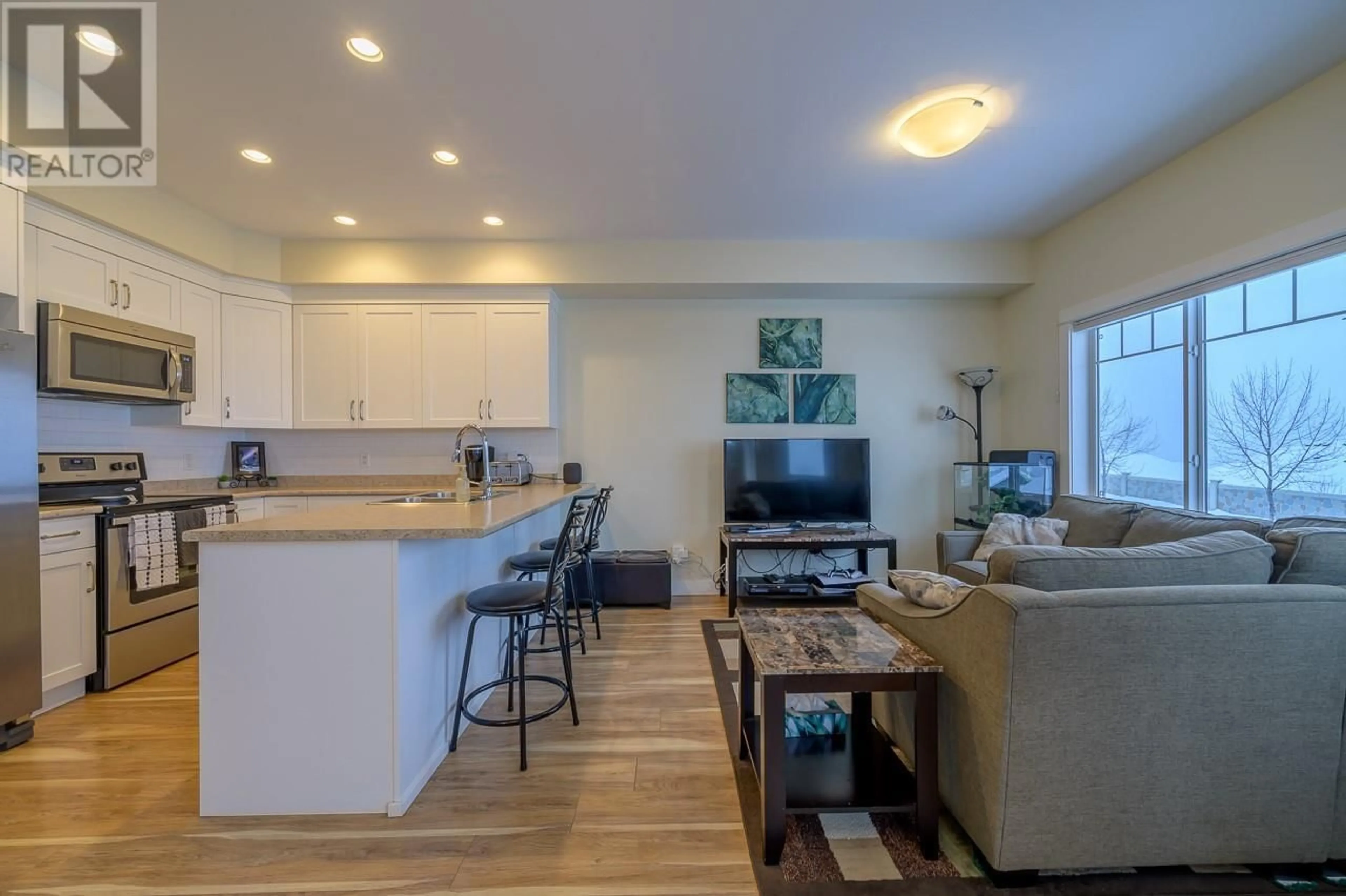 Open concept kitchen, wood/laminate floor for 114 - 1325 ABERDEEN DRIVE, Kamloops British Columbia V1S0C7