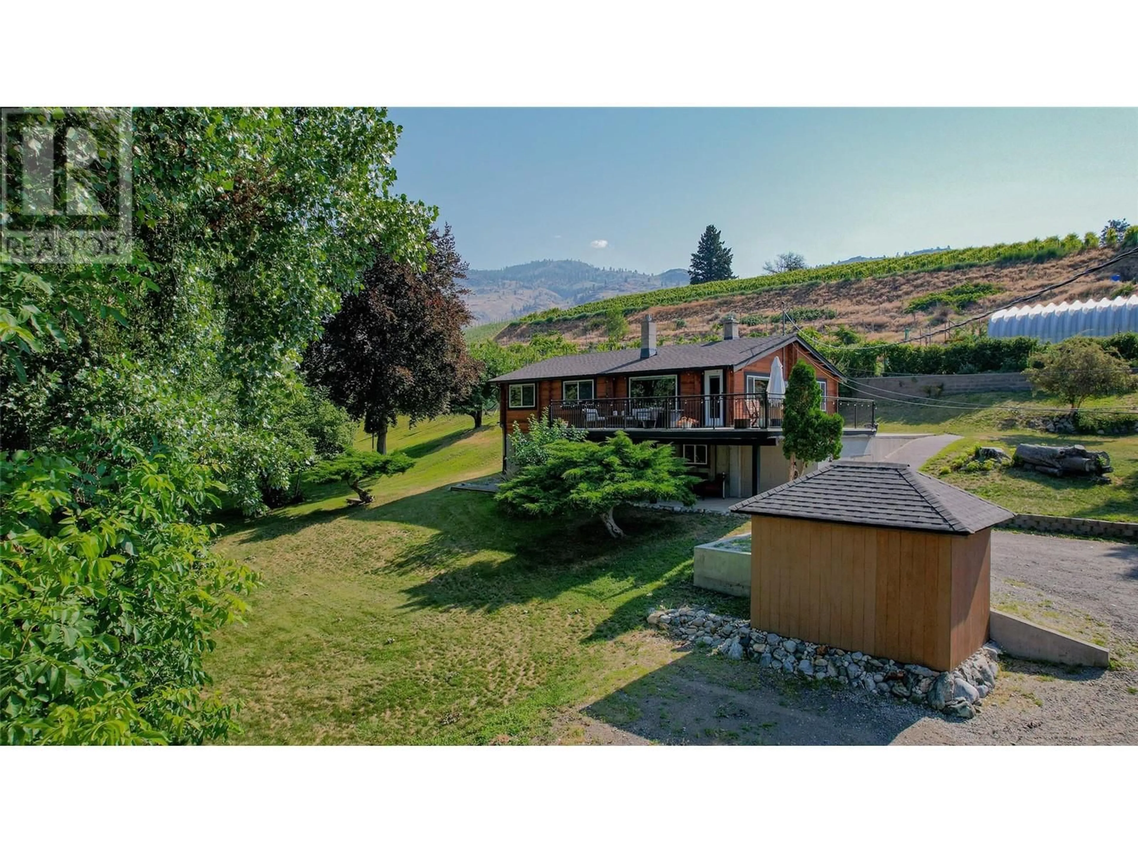 A pic from outside/outdoor area/front of a property/back of a property/a pic from drone, mountain view for 4613 41ST Street, Osoyoos British Columbia V0H1V6