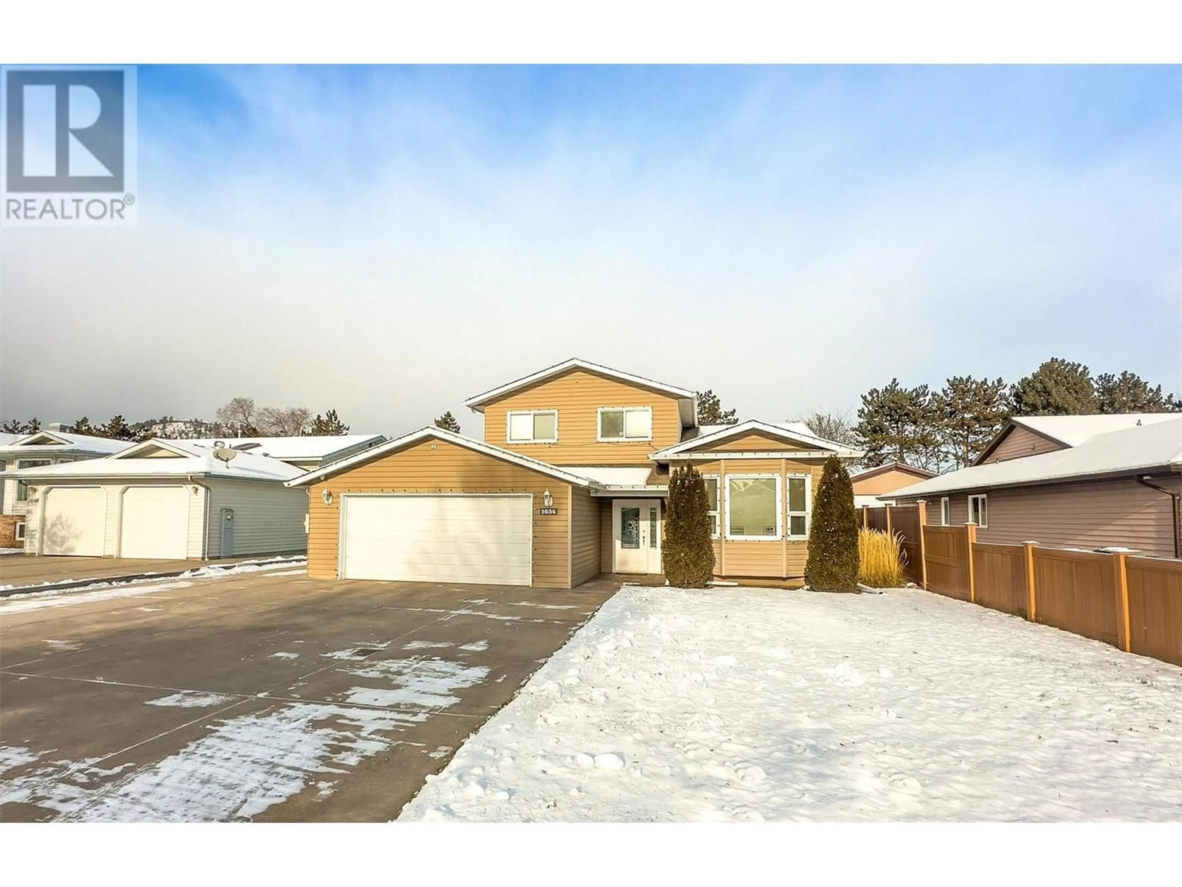 A pic from outside/outdoor area/front of a property/back of a property/a pic from drone, street for 1634 Carshyl Court, Kelowna British Columbia V1X6Y7