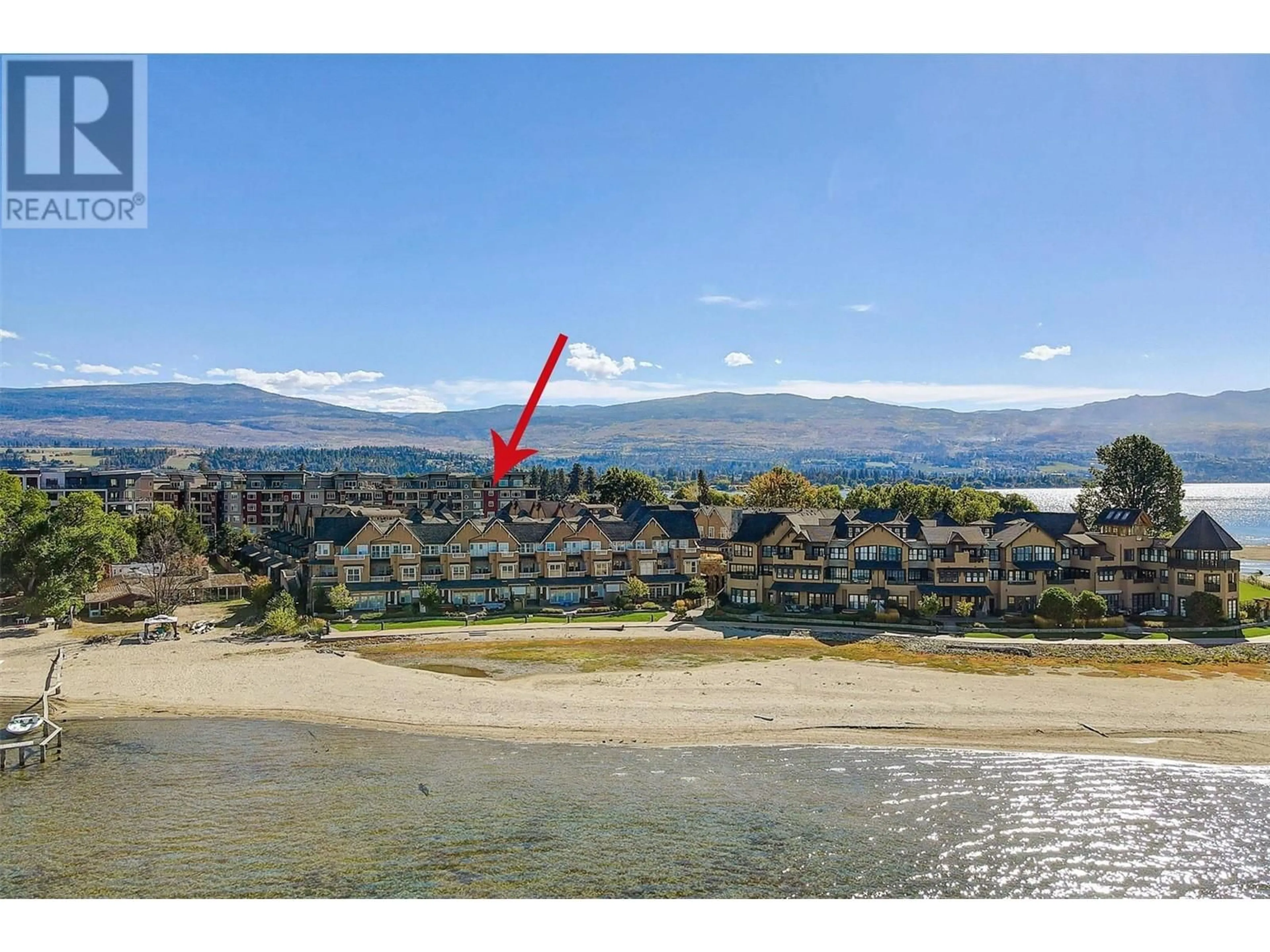 A pic from outside/outdoor area/front of a property/back of a property/a pic from drone, water/lake/river/ocean view for 3865 Truswell Road Unit# 311, Kelowna British Columbia V1W3K9