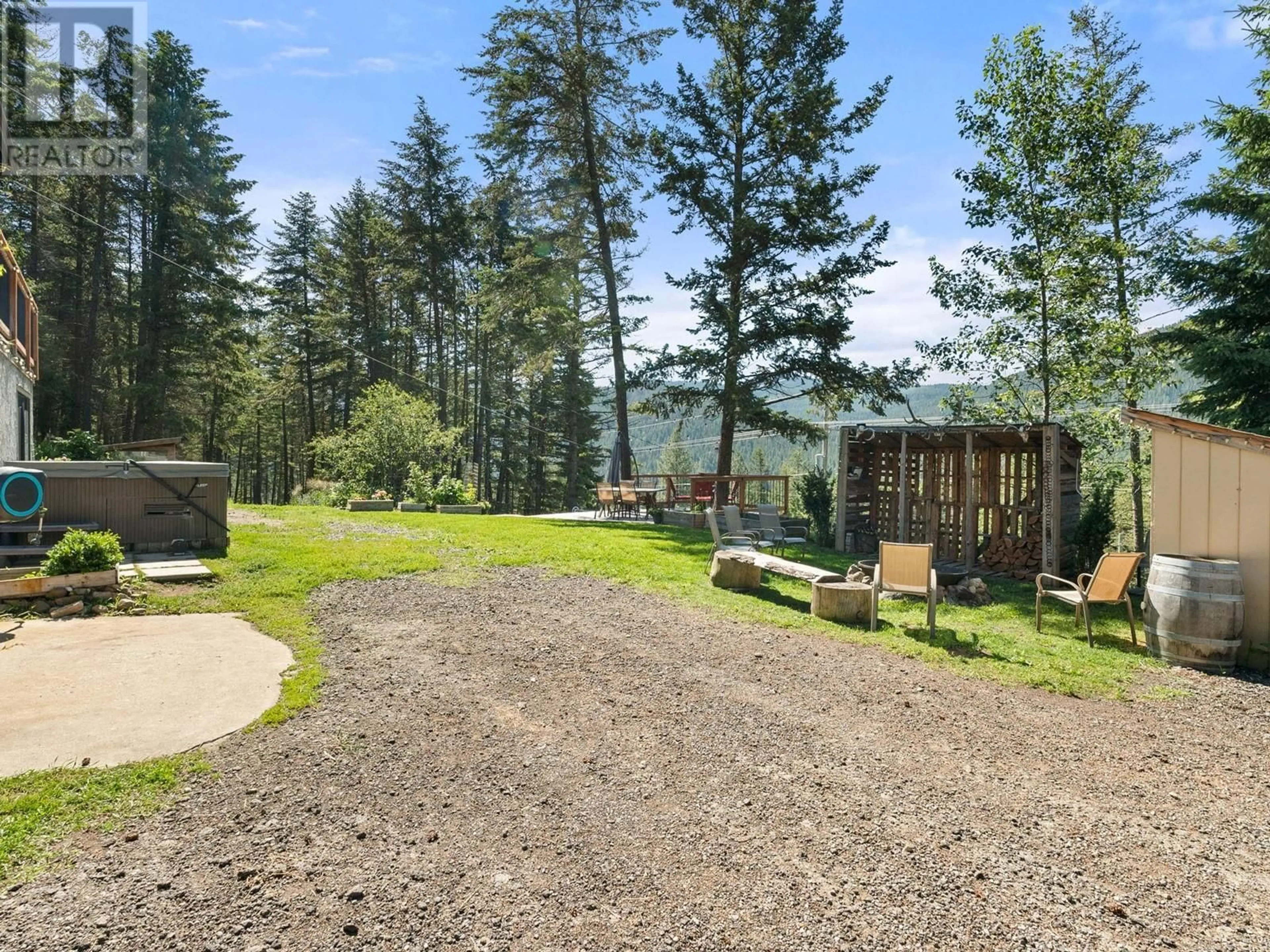 Patio, forest/trees view for 1809 CARDINAL CREEK ROAD, Kelowna British Columbia V1P1J3