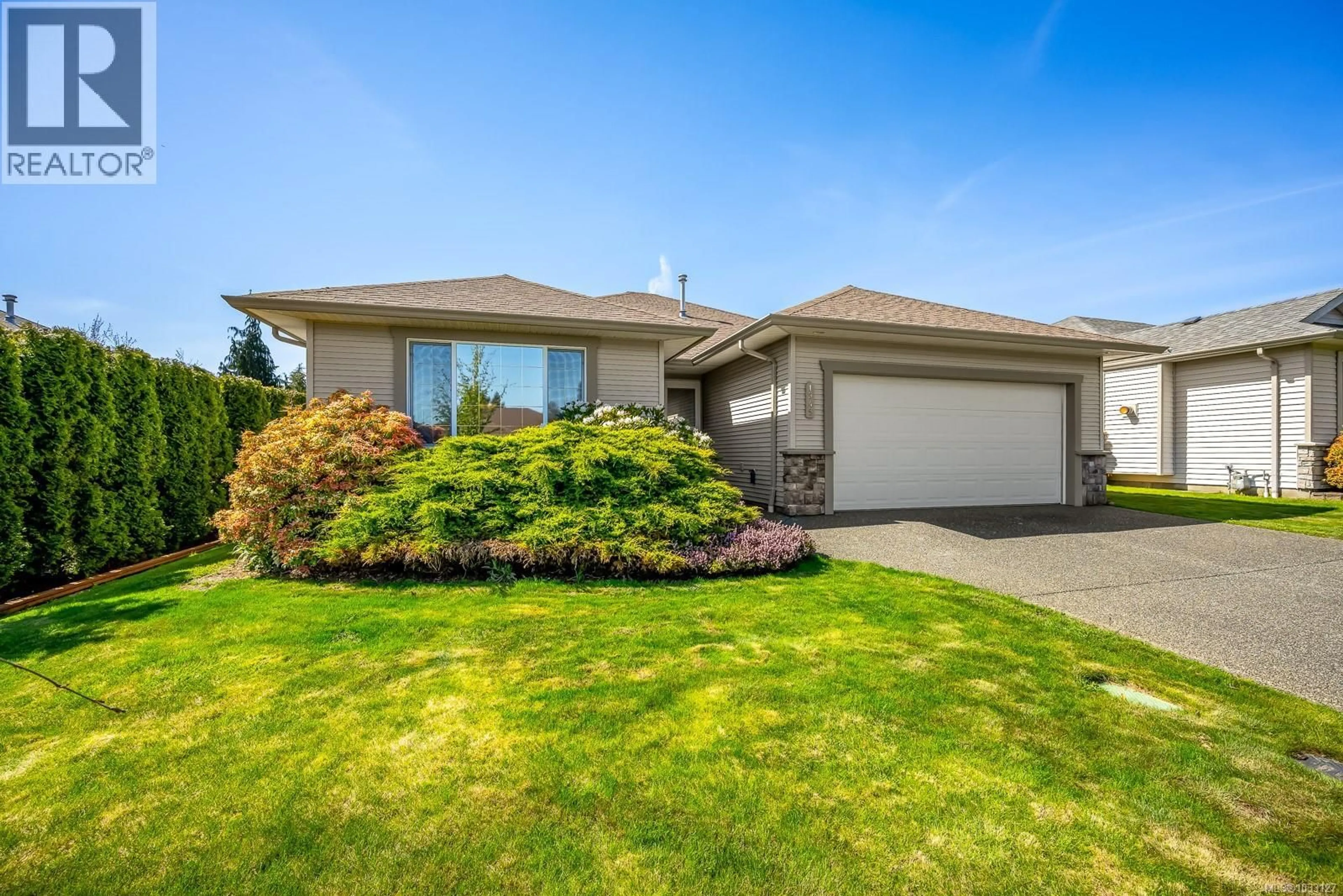 Home with vinyl exterior material, street for 1945 ST. ANDREWS PLACE, Courtenay British Columbia V9N9J4