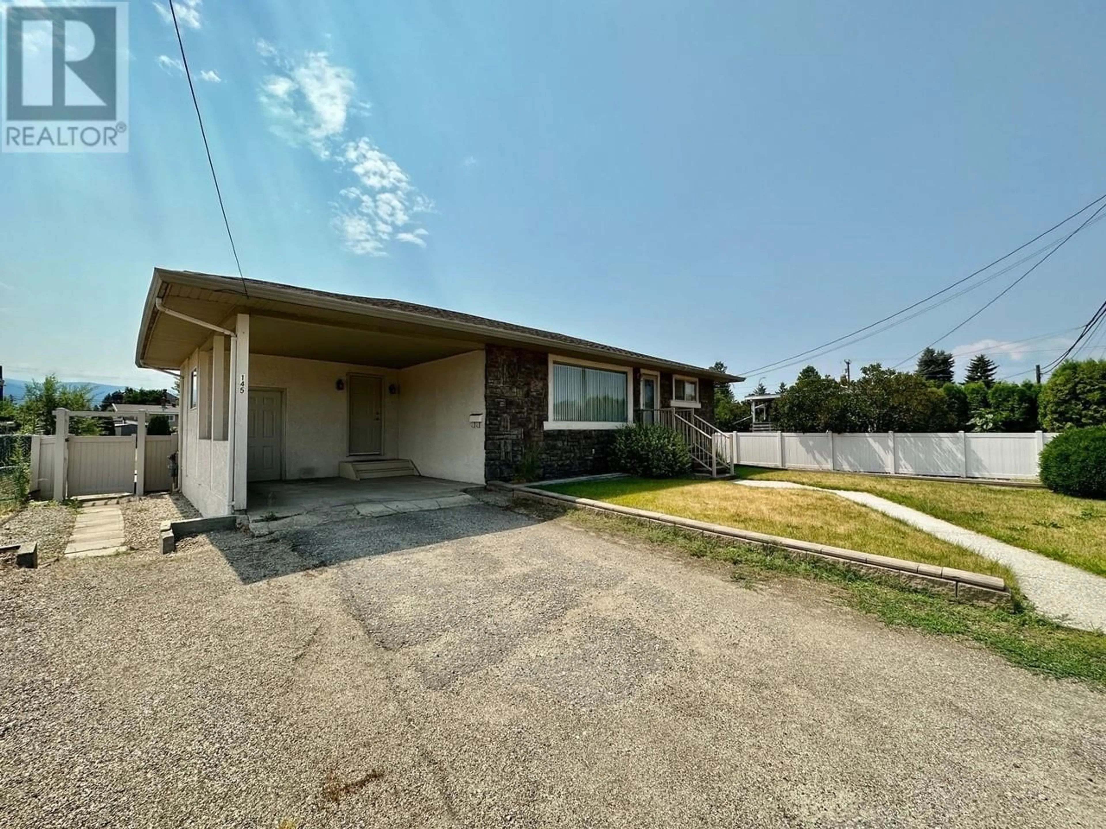 A pic from outside/outdoor area/front of a property/back of a property/a pic from drone, street for 145 Hardie Road, Rutland British Columbia V1X2G9