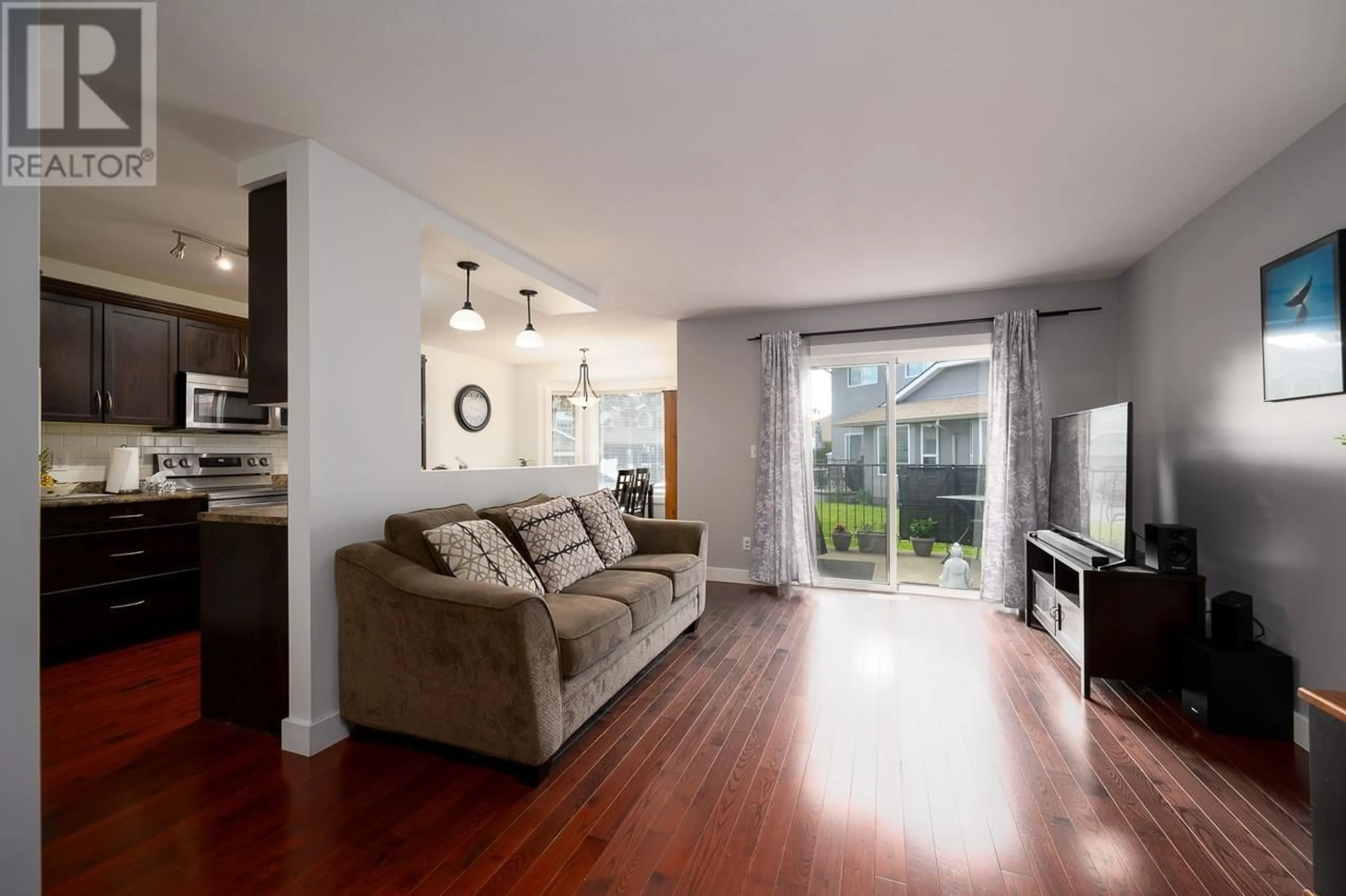 Living room with furniture, wood/laminate floor for 1750 MCKINLEY Court Unit# 9, Kamloops British Columbia V2E2N5