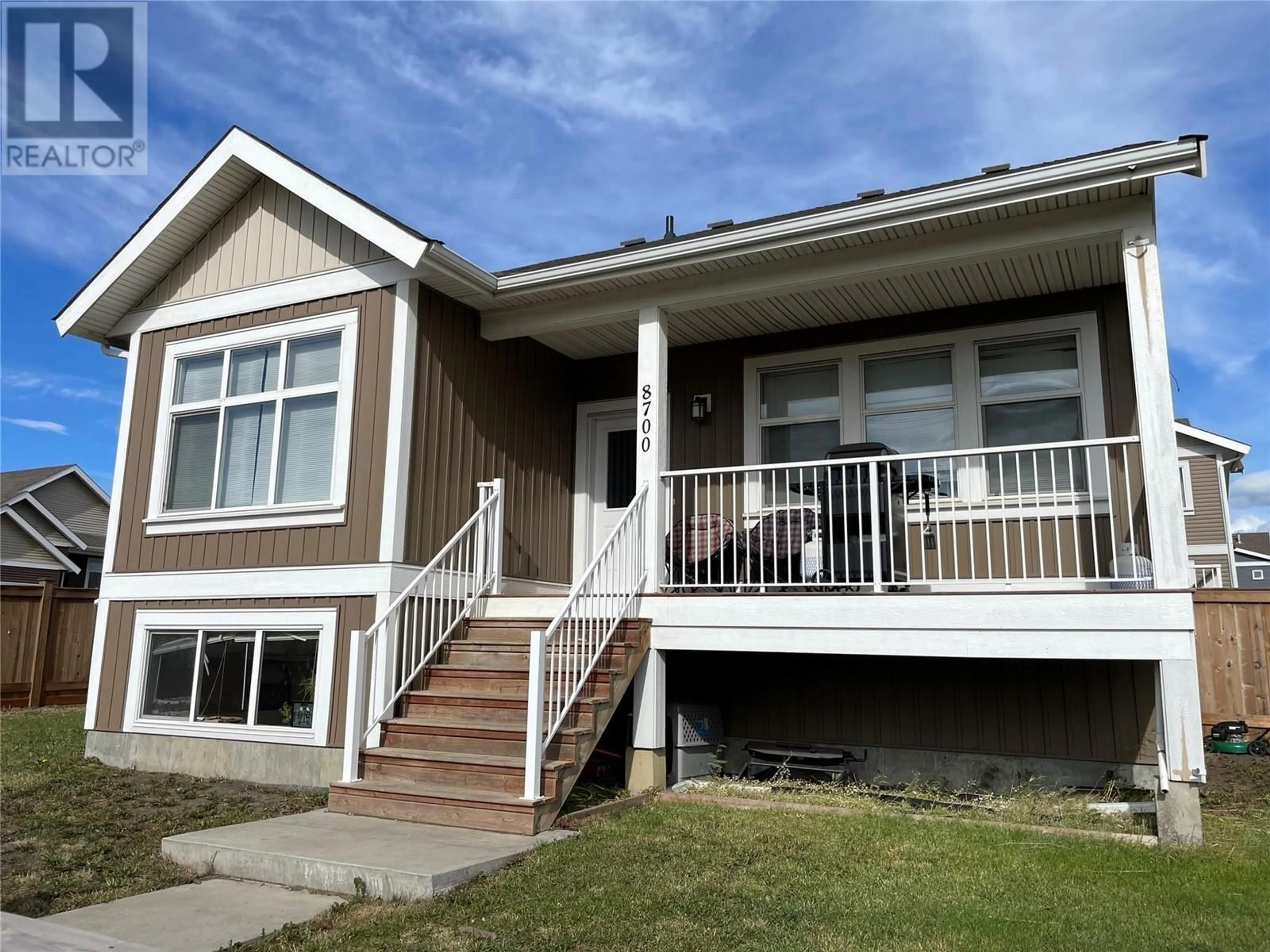 Home with vinyl exterior material, street for 8700 17 Street, Dawson Creek British Columbia V1G0H1