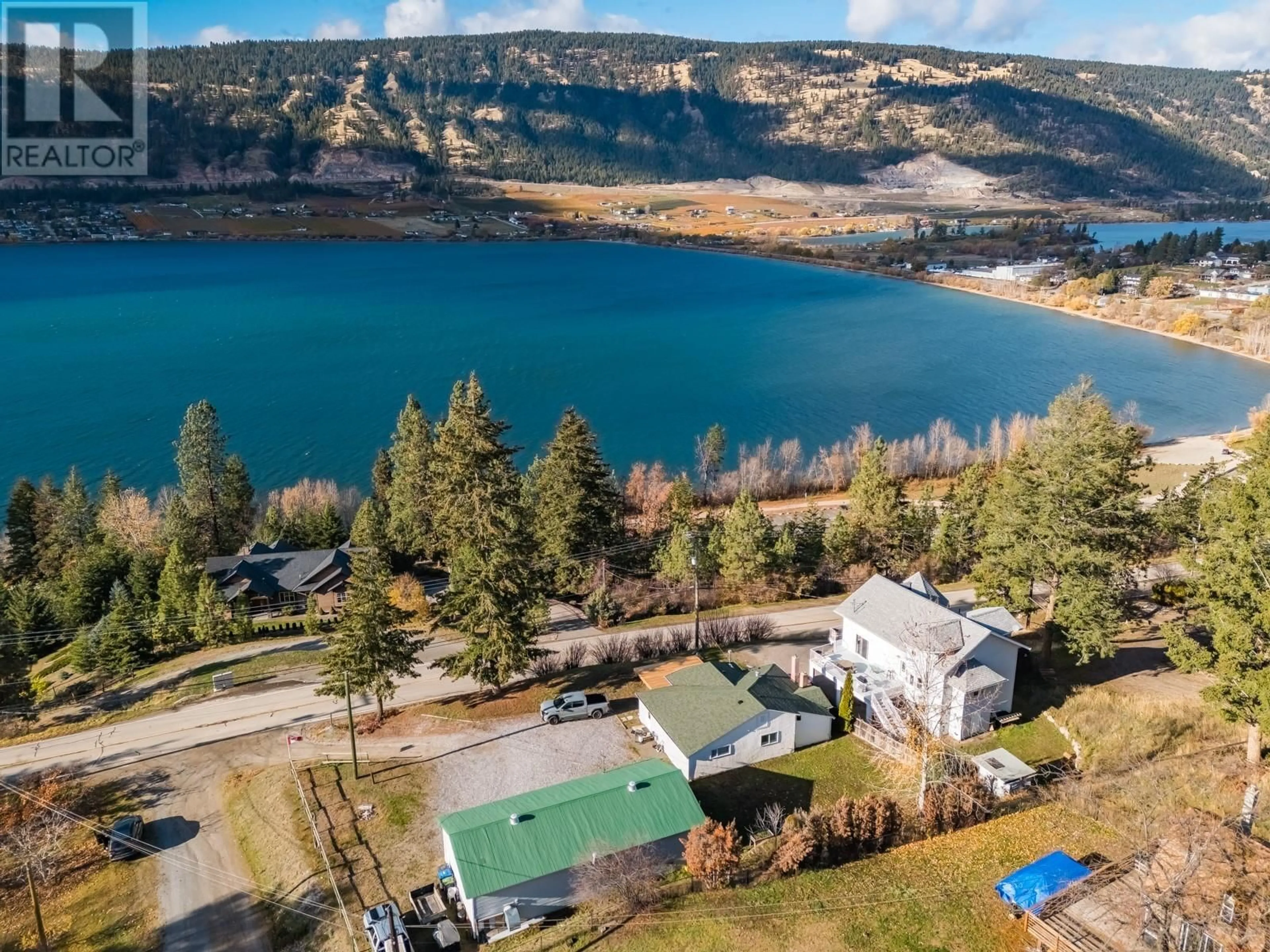 A pic from outside/outdoor area/front of a property/back of a property/a pic from drone, water/lake/river/ocean view for 15091 Oyama Road, Lake Country British Columbia V4V2C6