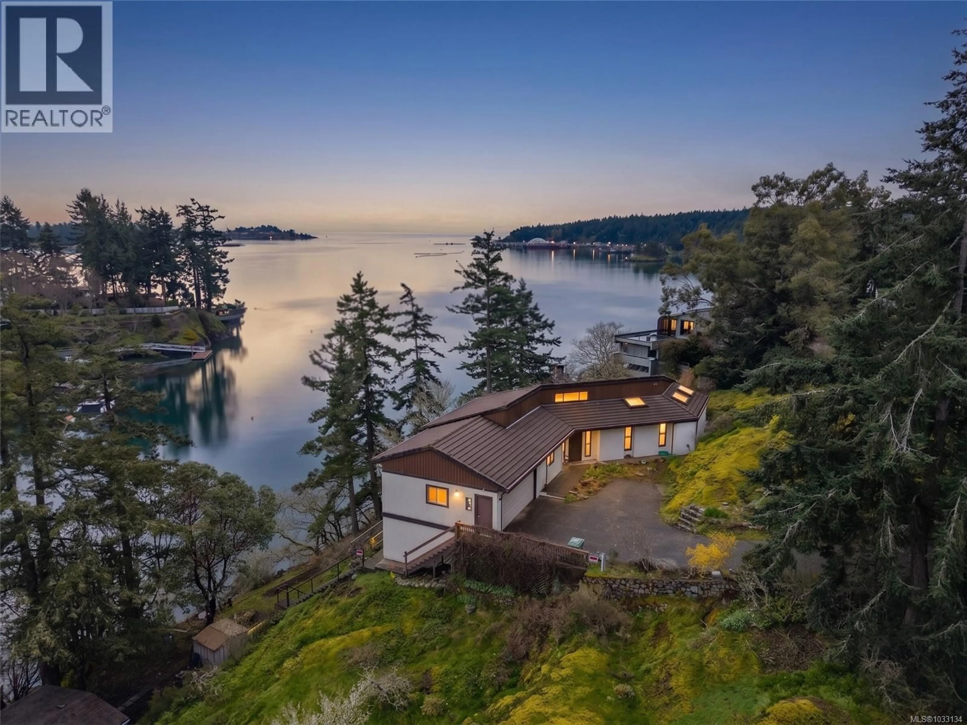 A pic from outside/outdoor area/front of a property/back of a property/a pic from drone, water/lake/river/ocean view for 312 BESSBOROUGH AVENUE, View Royal British Columbia V9B1T7