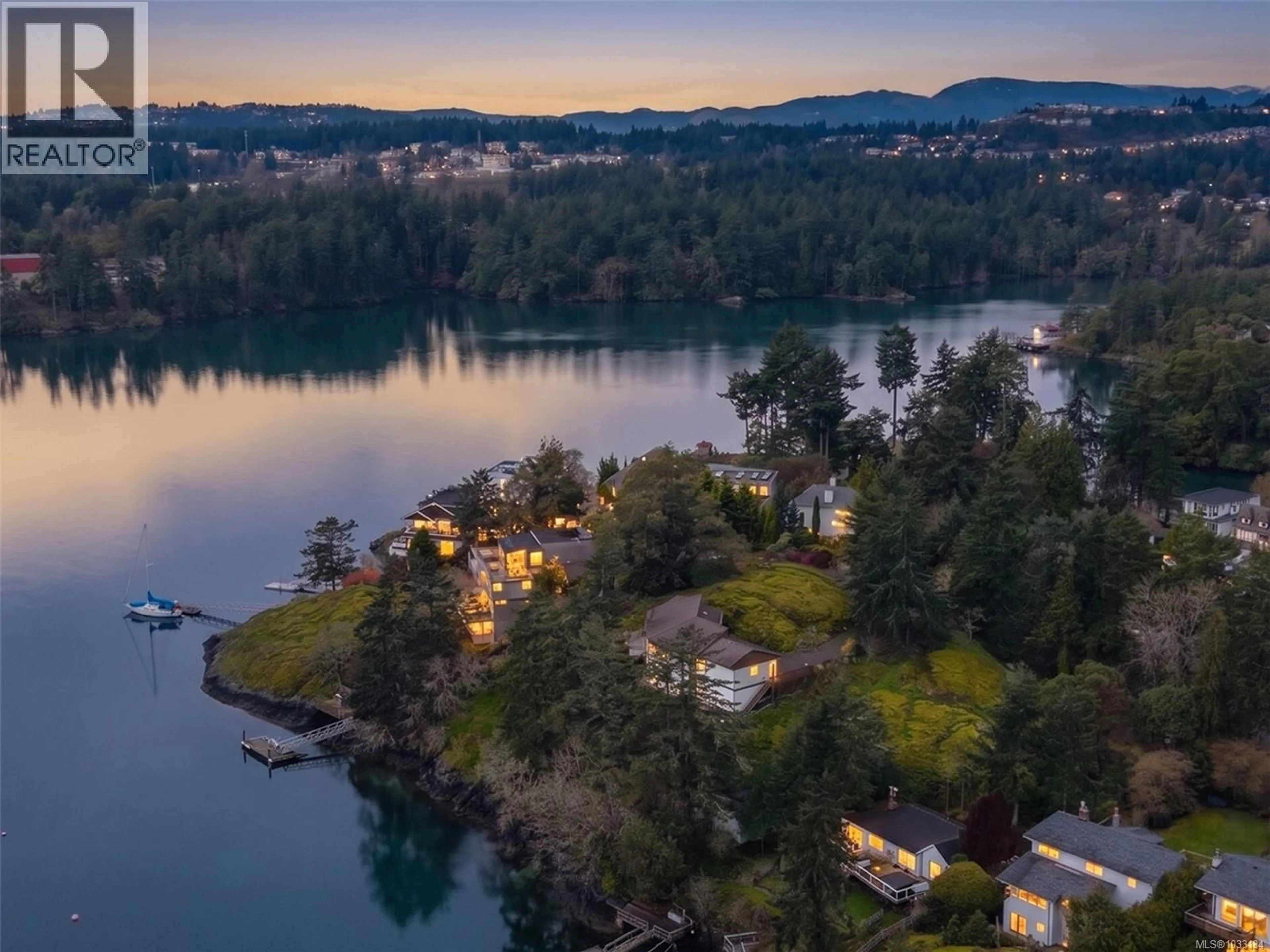 A pic from outside/outdoor area/front of a property/back of a property/a pic from drone, water/lake/river/ocean view for 312 BESSBOROUGH AVENUE, View Royal British Columbia V9B1T7