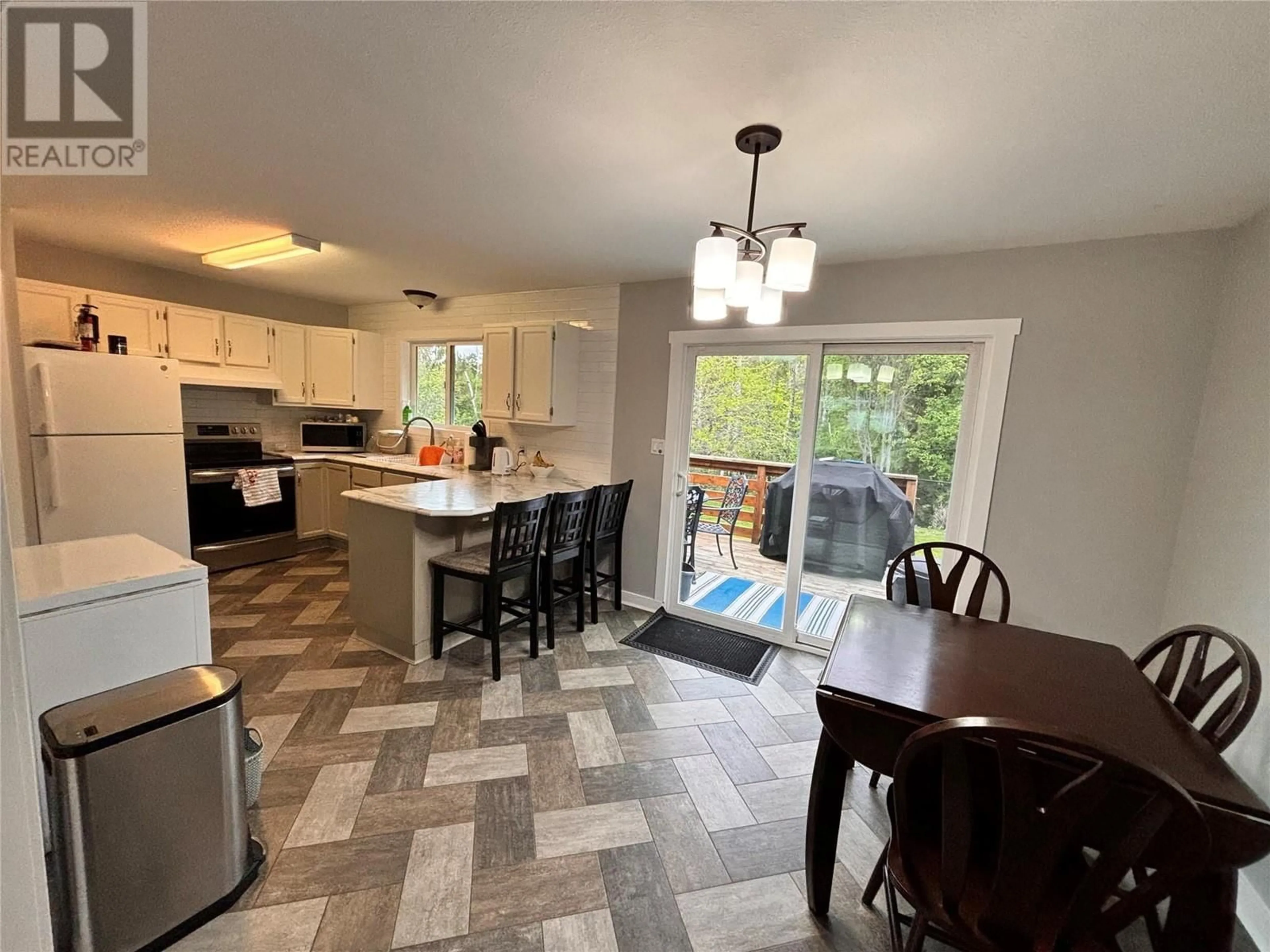 Open concept kitchen, ceramic/tile floor for 2131 23 Avenue NE, Salmon Arm British Columbia V1E3E7