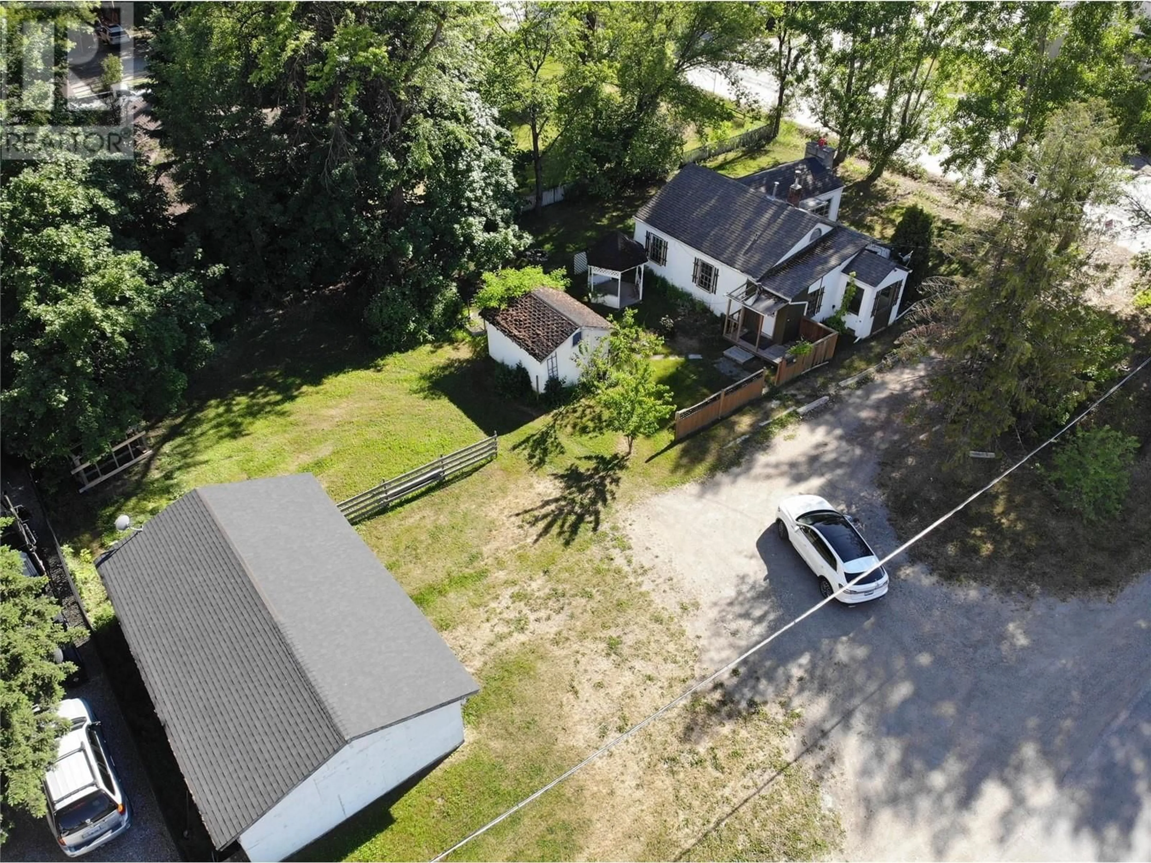 A pic from outside/outdoor area/front of a property/back of a property/a pic from drone, street for 11283 Bottom Wood Lake Road, Lake Country British Columbia V4V1V9