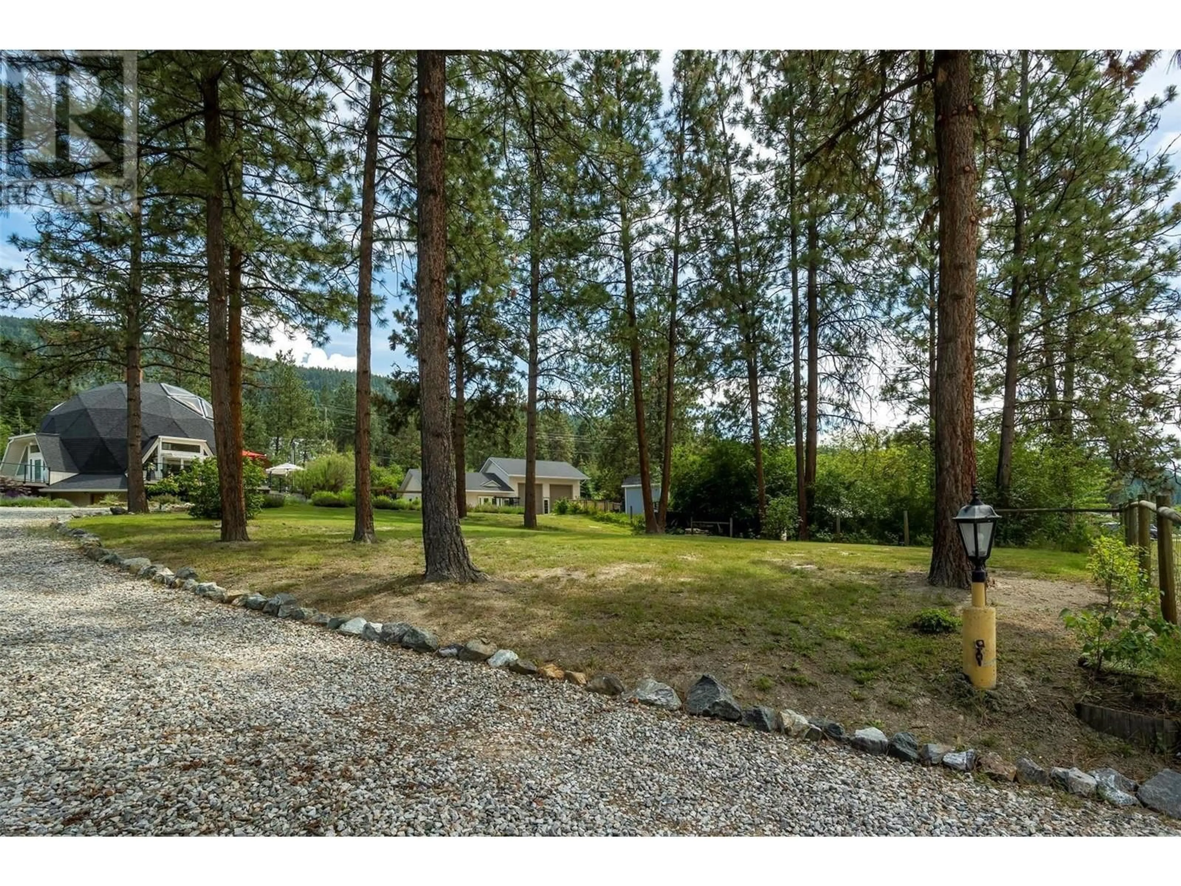 A pic from outside/outdoor area/front of a property/back of a property/a pic from drone, forest/trees view for 16709 Maki Road, Lake Country British Columbia V4V1C2