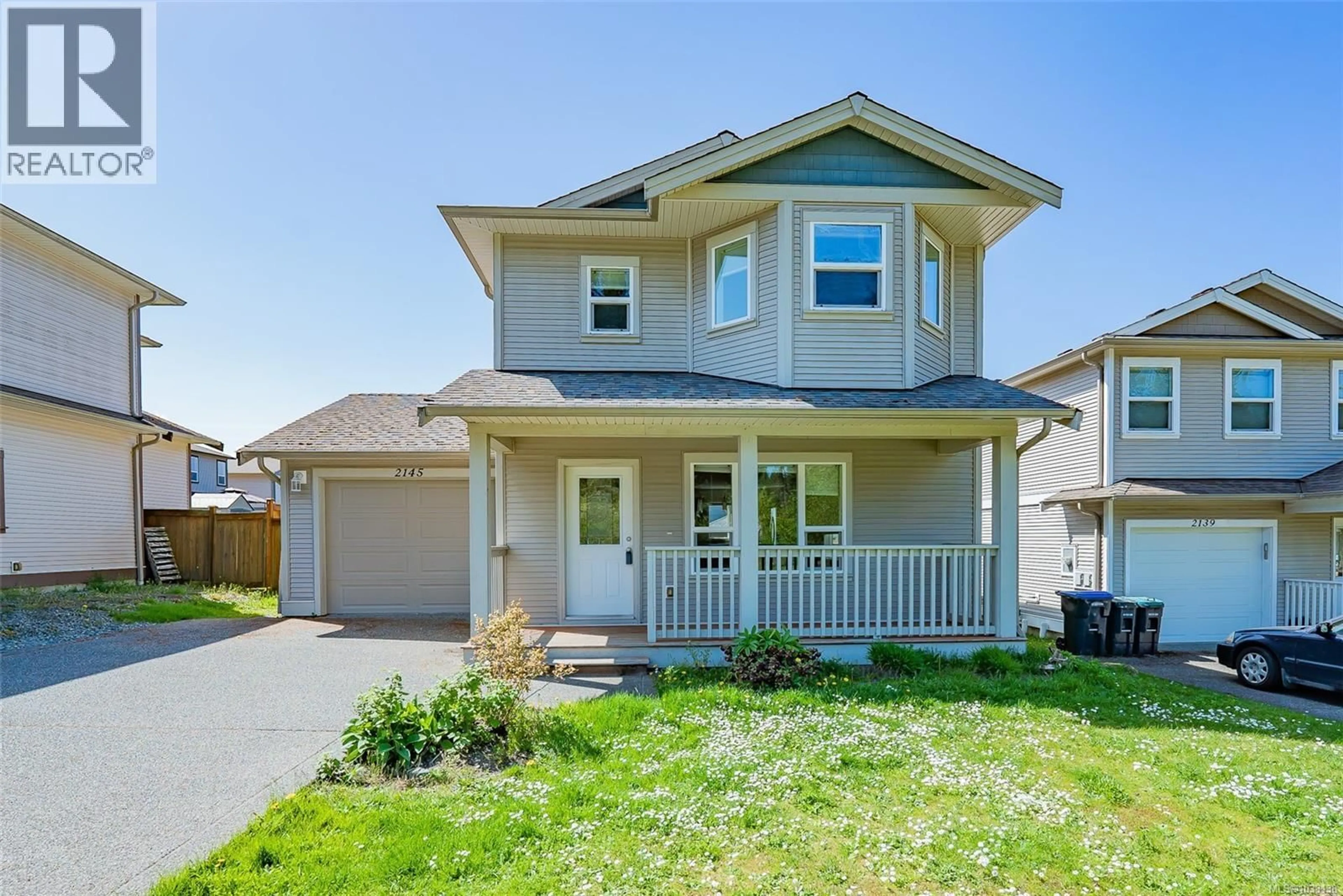 Home with vinyl exterior material, street for 2145 VILLAGE DRIVE, Nanaimo British Columbia V9X0A7