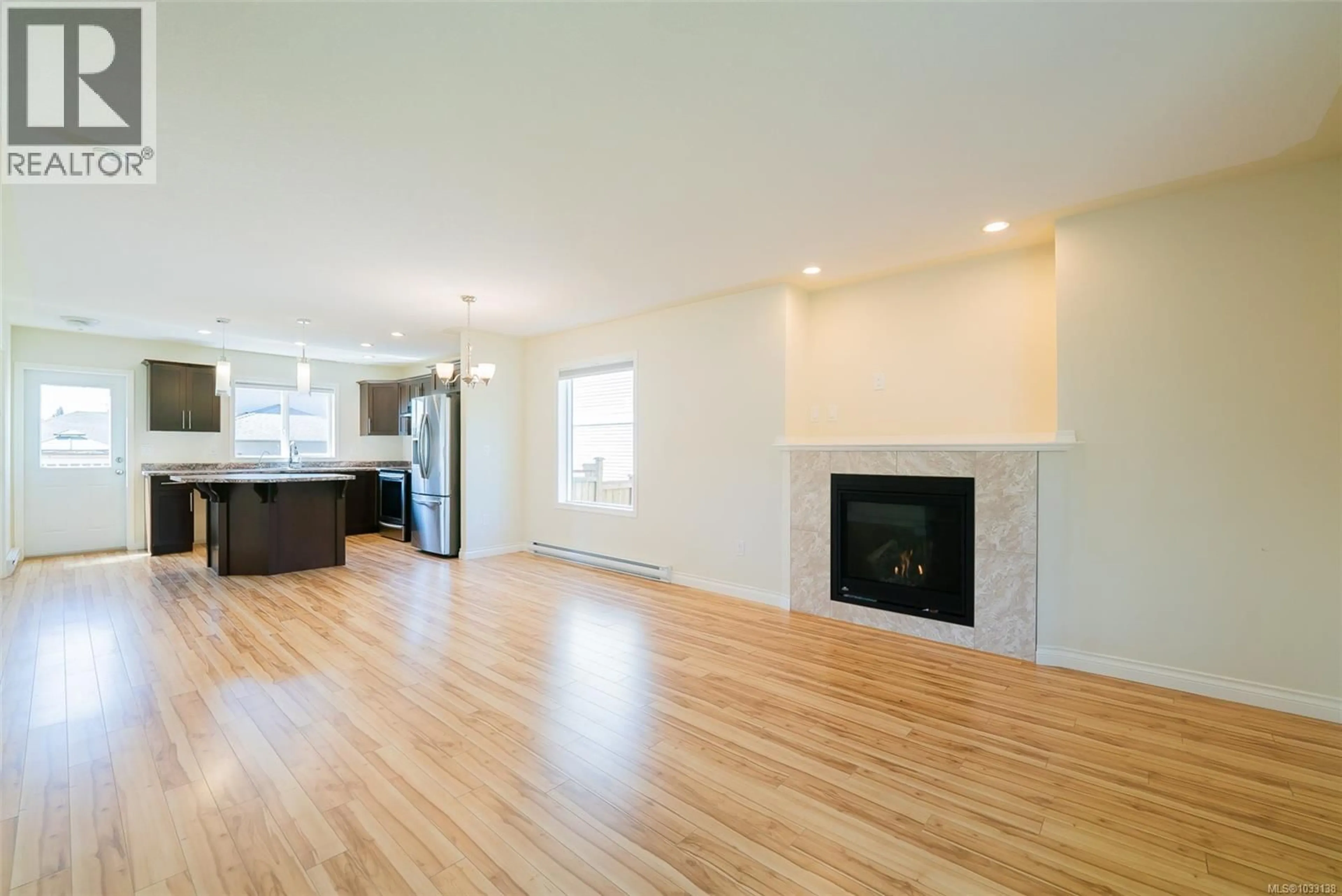 Open concept kitchen, wood/laminate floor for 2145 VILLAGE DRIVE, Nanaimo British Columbia V9X0A7