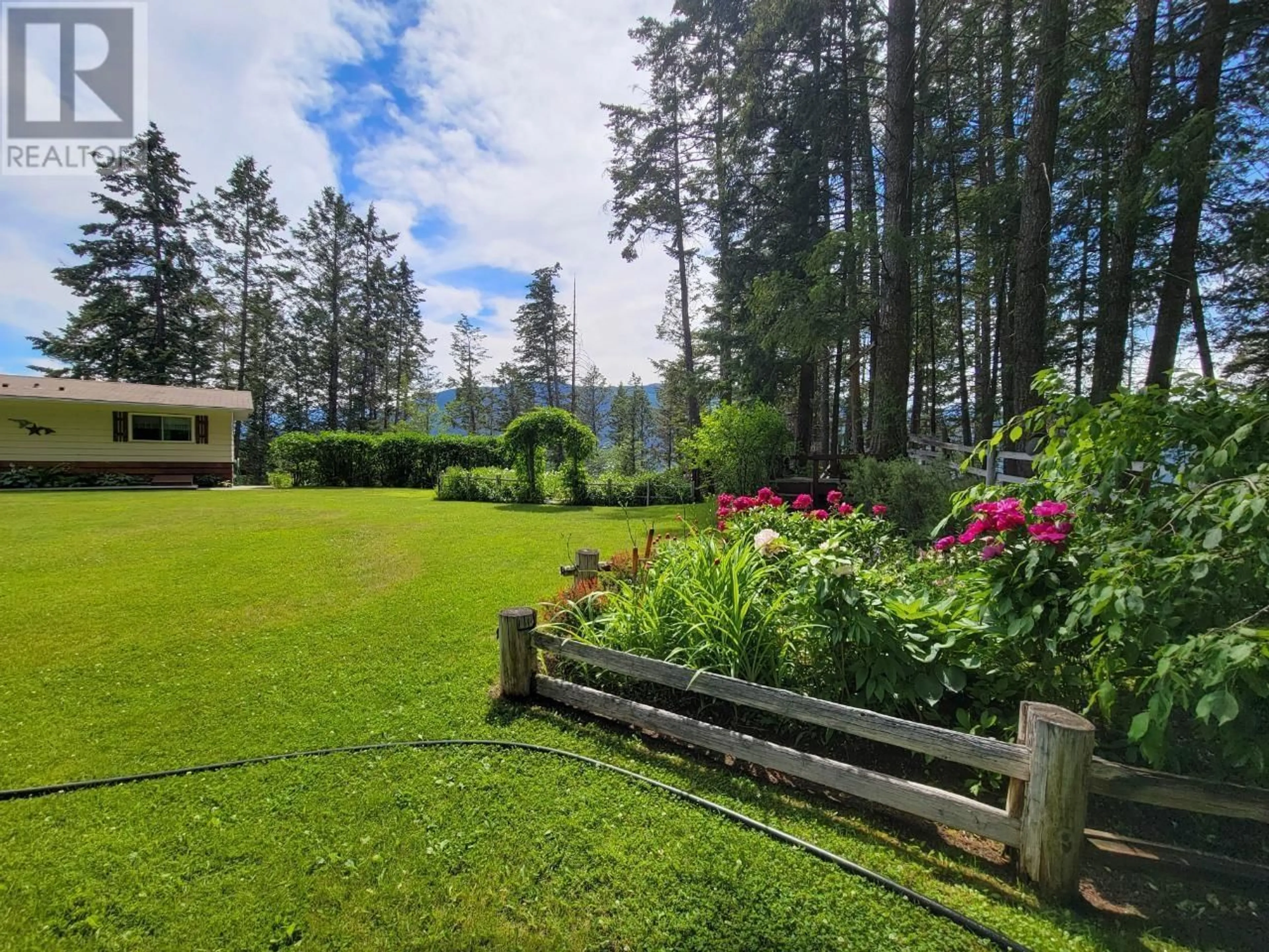 A pic from outside/outdoor area/front of a property/back of a property/a pic from drone, forest/trees view for 5041 HEWITT Road, Edgewater British Columbia V0A1E0