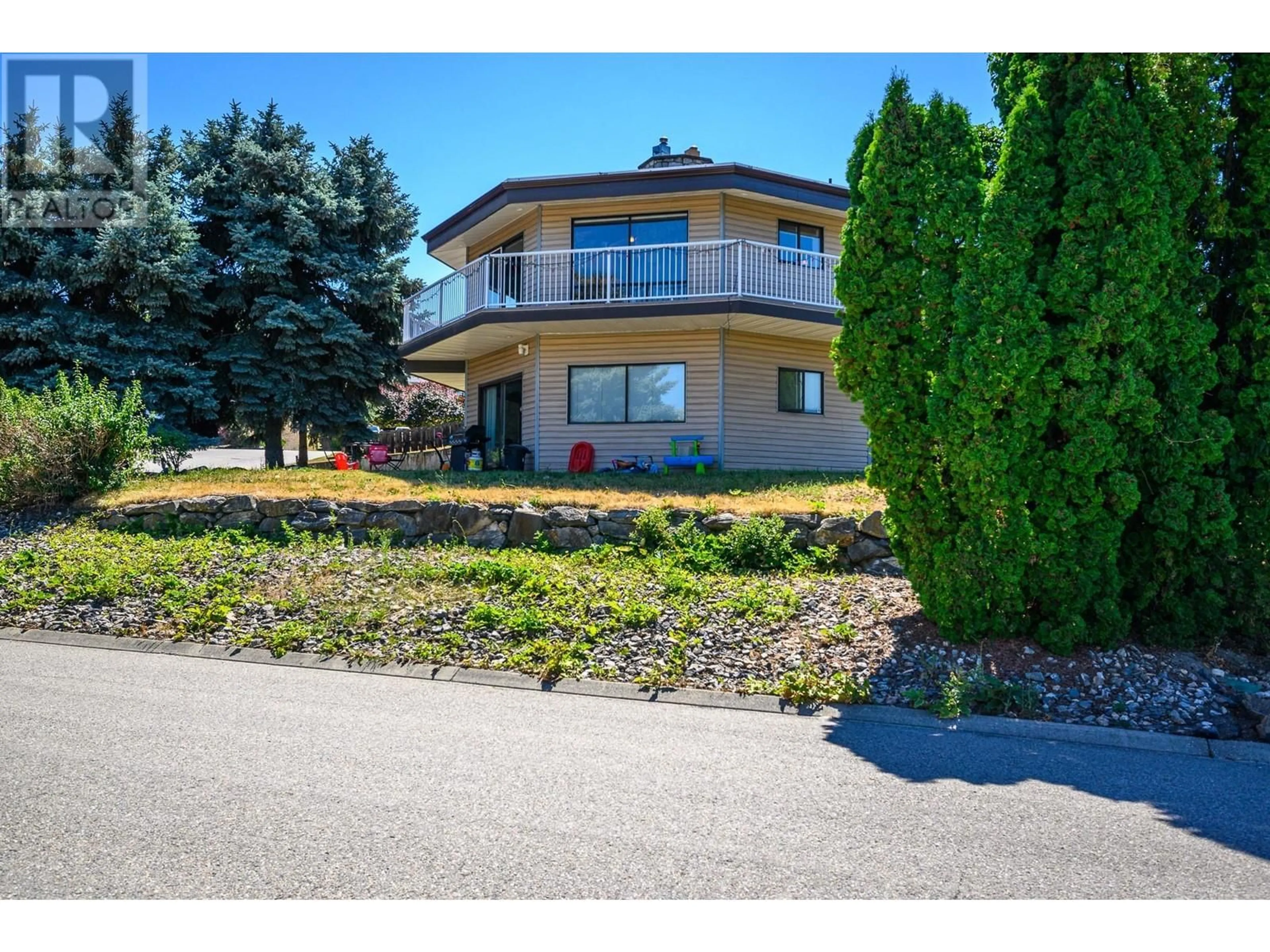 A pic from outside/outdoor area/front of a property/back of a property/a pic from drone, street for 2100 40 Street Lot# 4, Vernon British Columbia V1T7P1