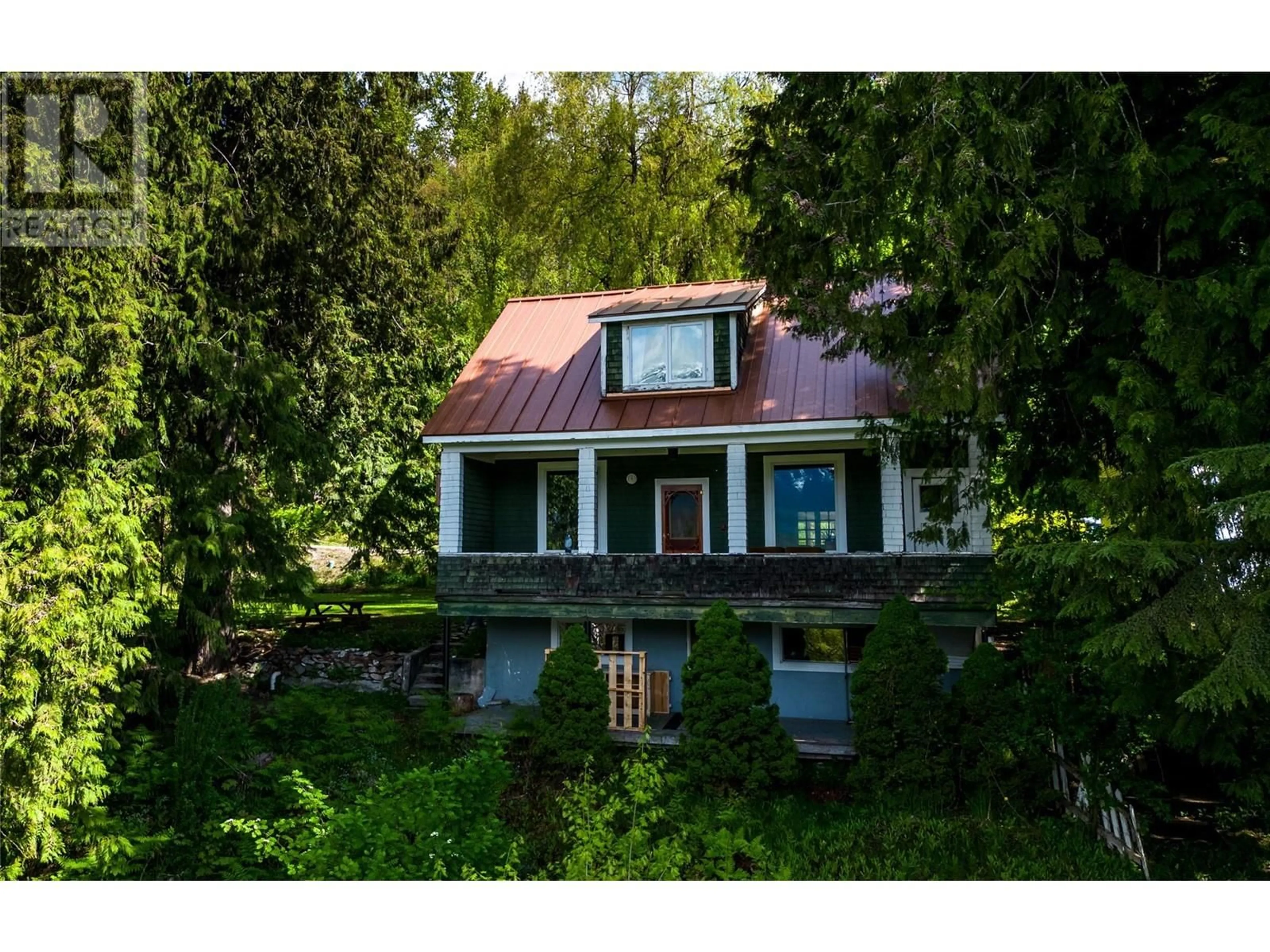 A pic from outside/outdoor area/front of a property/back of a property/a pic from drone, street for 129 Maple Street, Revelstoke British Columbia V0E2S0