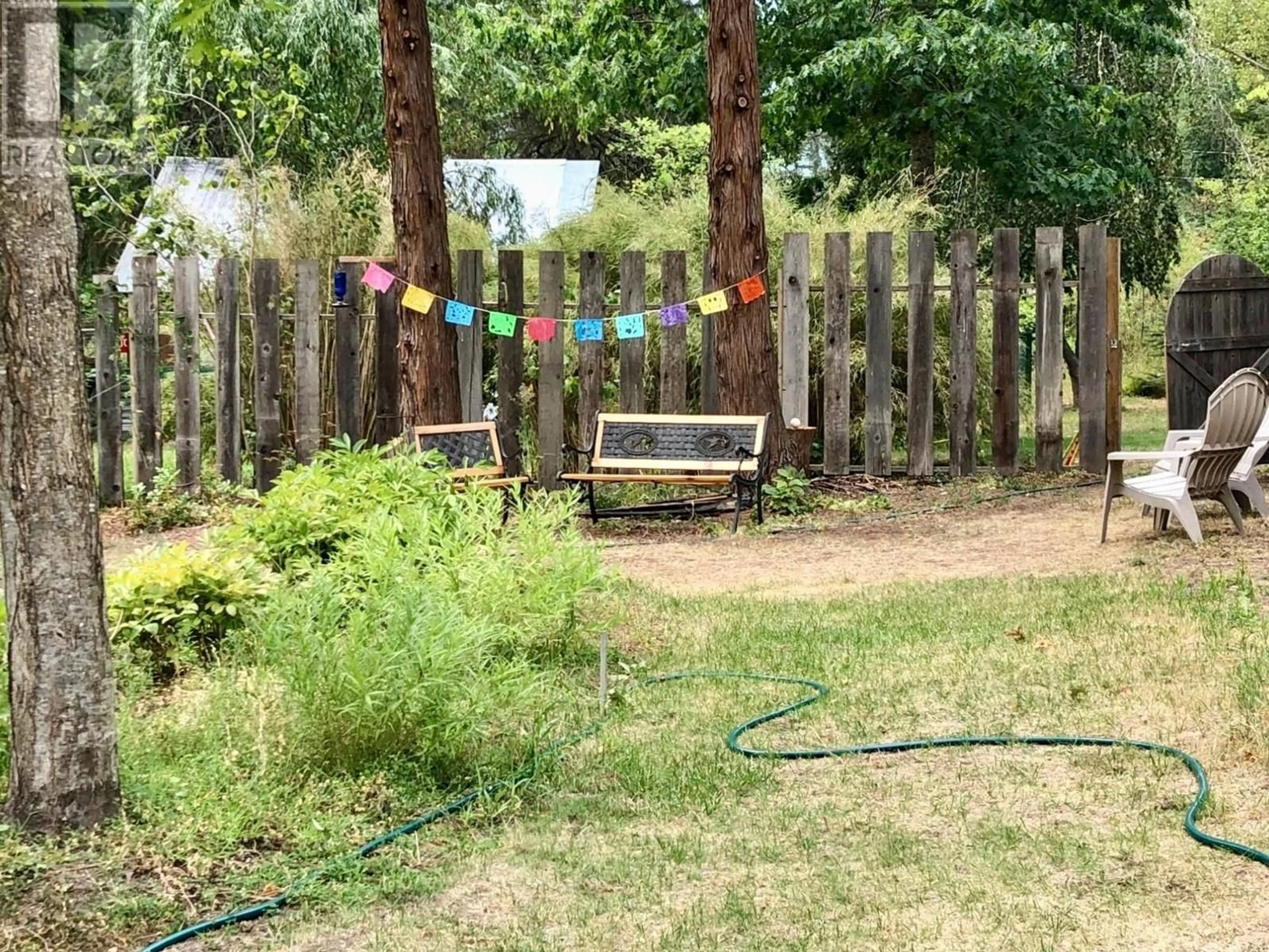 Patio, forest/trees view for 1949 FIFE Road, Christina Lake British Columbia V0H1E0