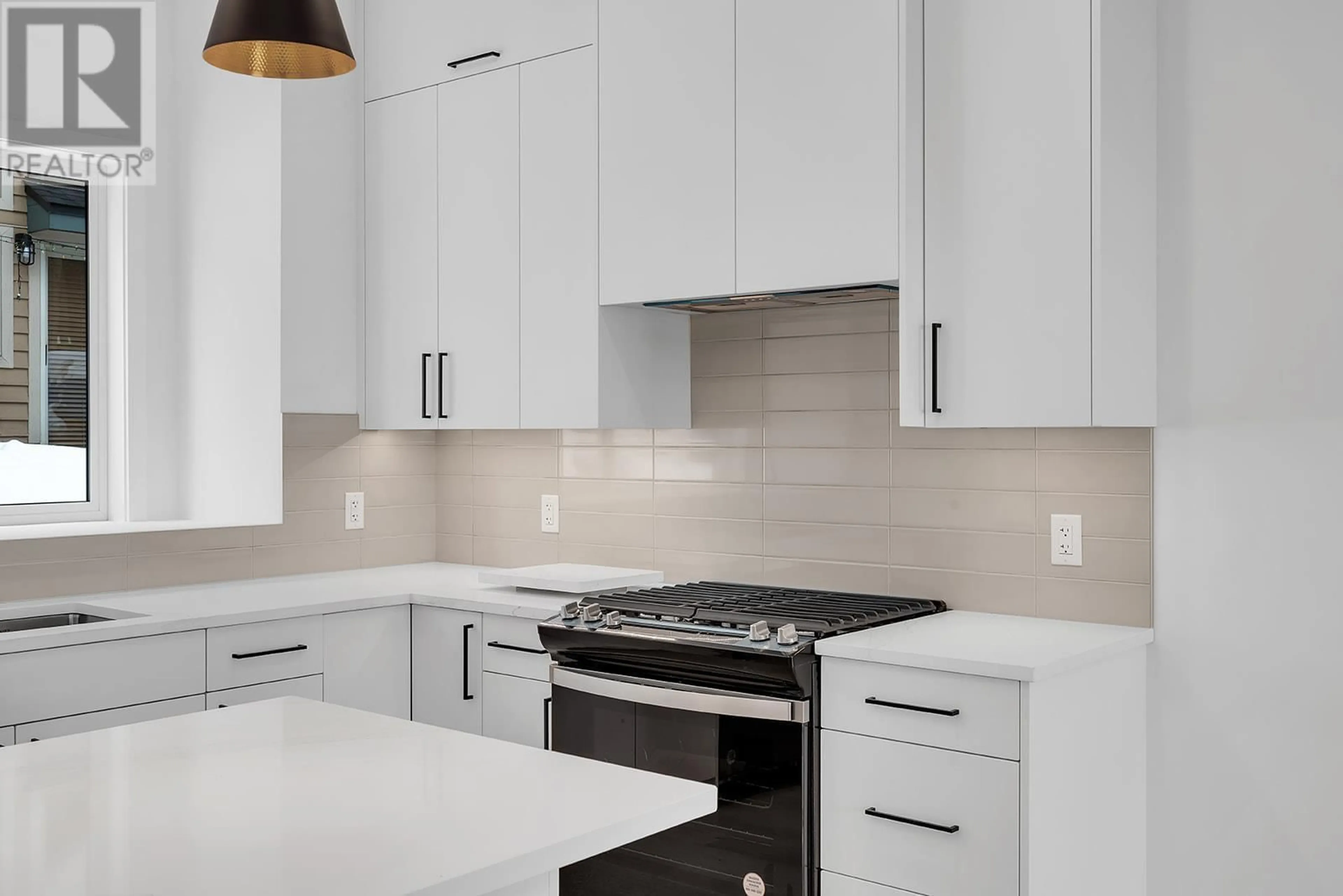 Contemporary kitchen, ceramic/tile floor for 2 - 4495 WALKER ROAD, Kelowna British Columbia V1W1G8