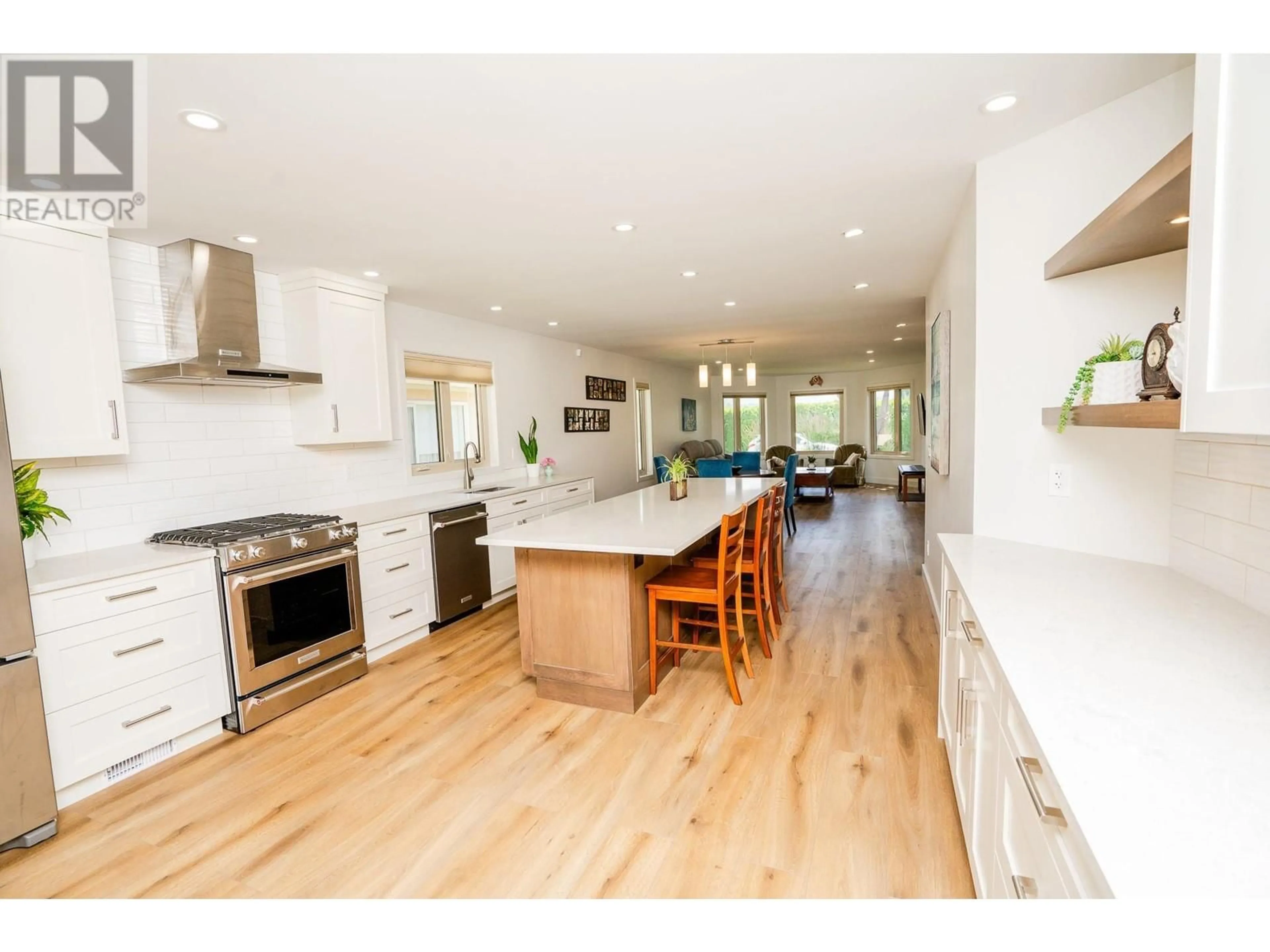 Open concept kitchen, wood/laminate floor for 1201 Cameron Avenue Unit# 53, Kelowna British Columbia V1W3R8