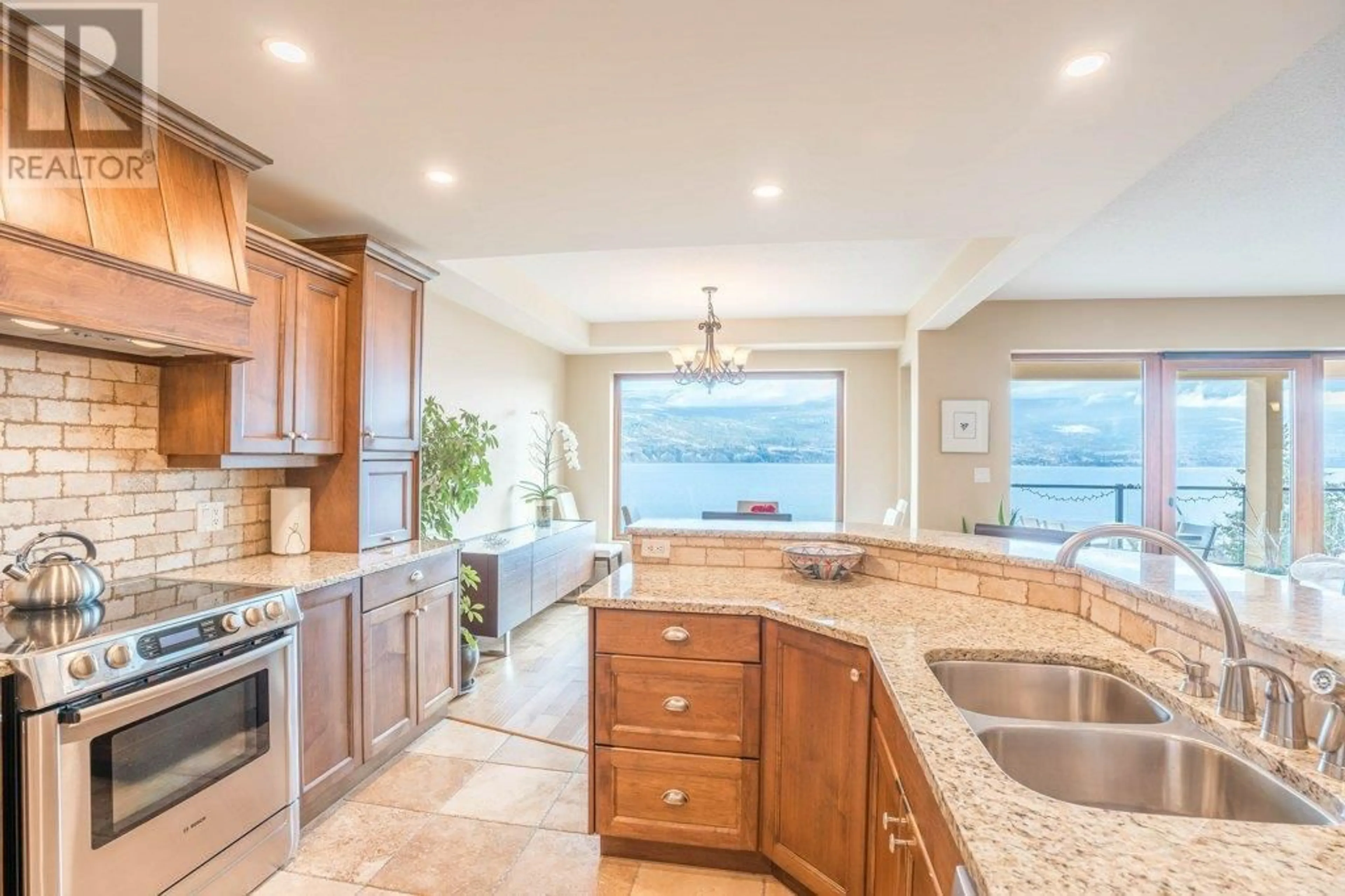 Open concept kitchen, ceramic/tile floor for 207 - 14419 DOWNTON AVENUE, Summerland British Columbia V0H1Z2