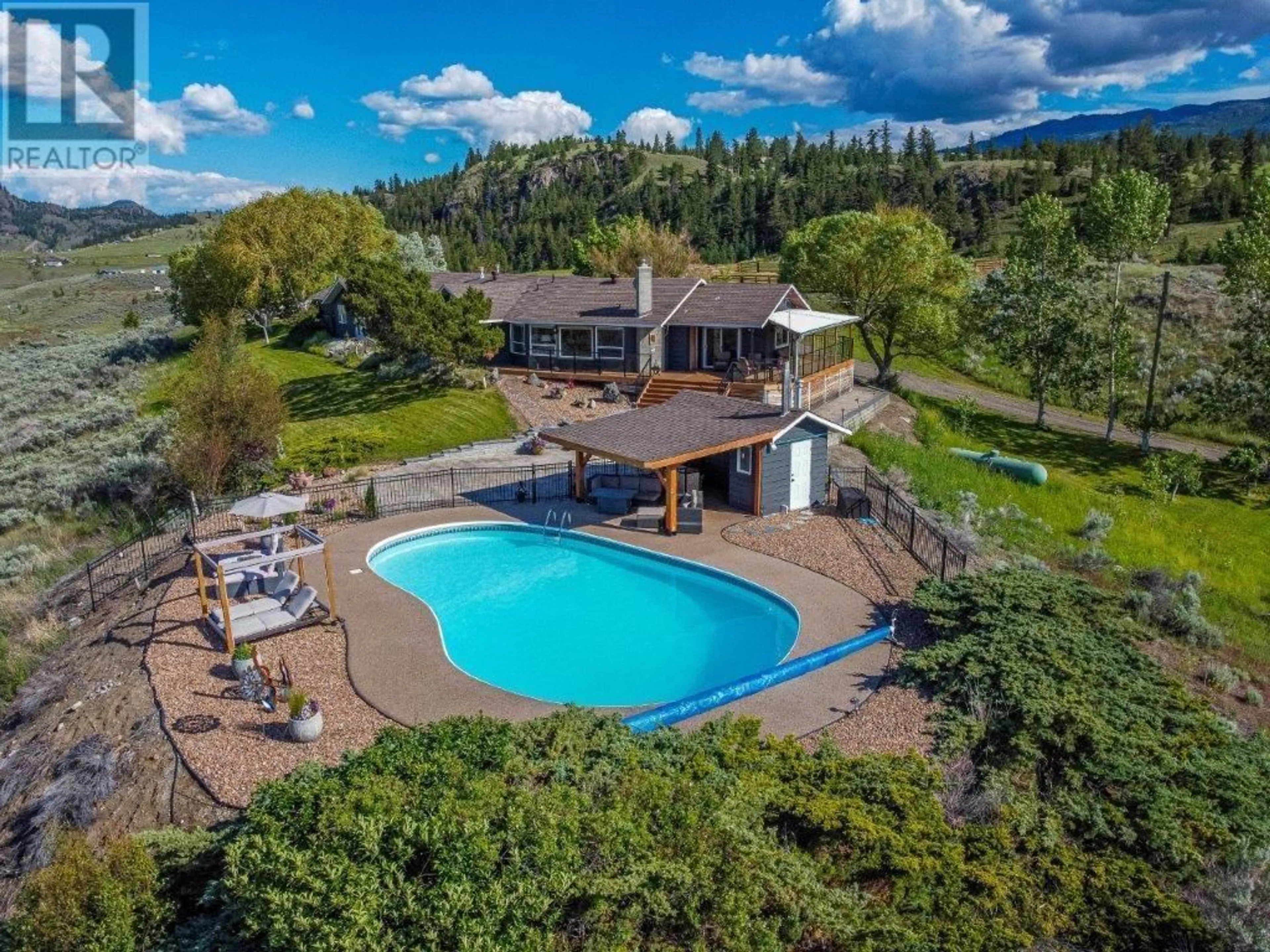 A pic from outside/outdoor area/front of a property/back of a property/a pic from drone, water/lake/river/ocean view for 5657 BEATON Road, Kamloops British Columbia V1S2A4