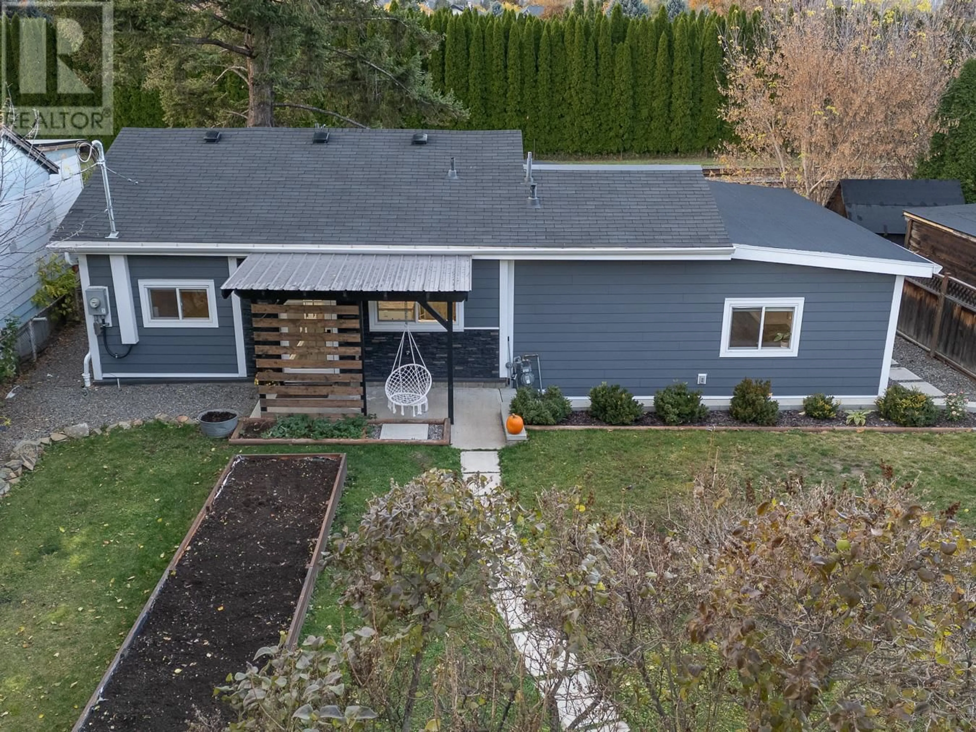 A pic from outside/outdoor area/front of a property/back of a property/a pic from drone, street for 4349 YELLOWHEAD Highway, Kamloops British Columbia V2H1N4