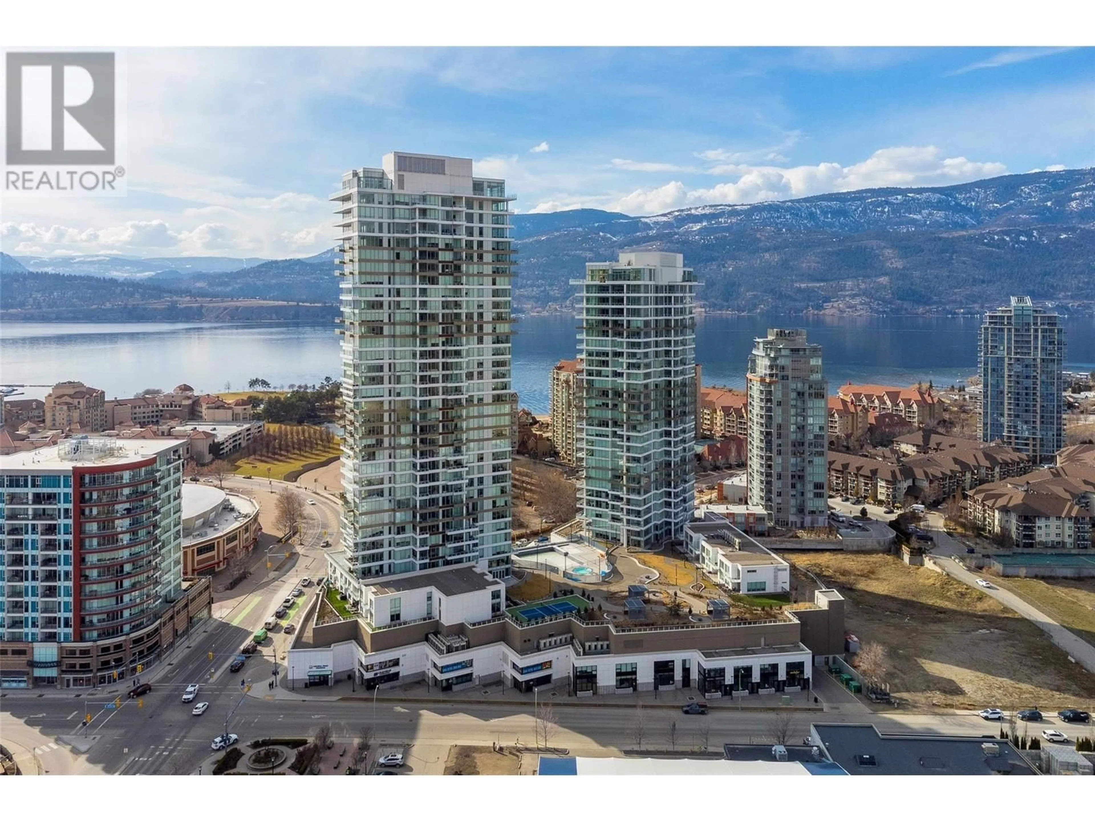A pic from outside/outdoor area/front of a property/back of a property/a pic from drone, water/lake/river/ocean view for 2202 - 1191 SUNSET DRIVE, Kelowna British Columbia V1Y0J4