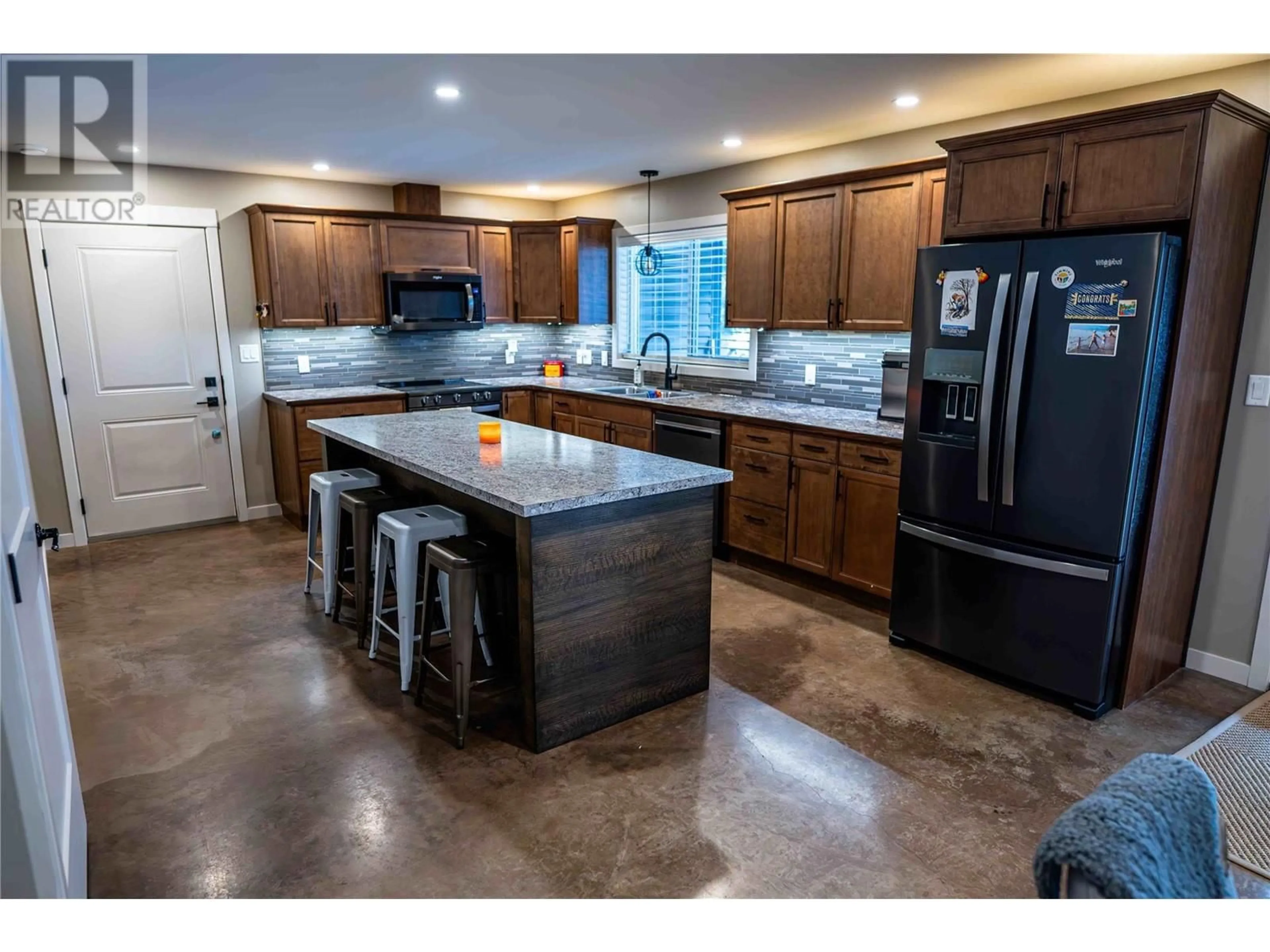 Open concept kitchen, ceramic/tile floor for 613 Glendale Avenue, Salmo British Columbia V0G1Z0