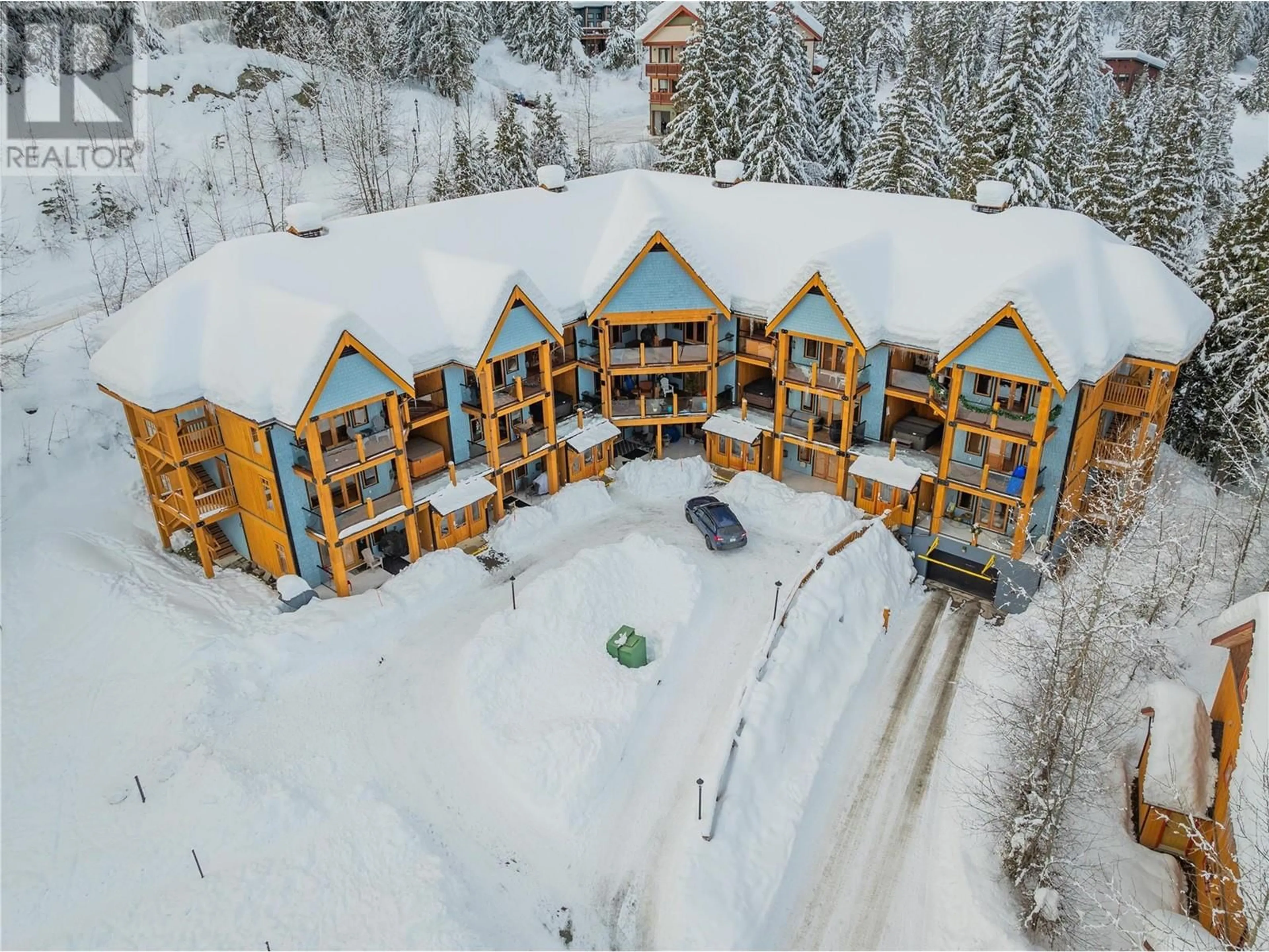 A pic from outside/outdoor area/front of a property/back of a property/a pic from drone, building for 1008 Olaus Way Unit# 7, Rossland British Columbia V0G1Y0