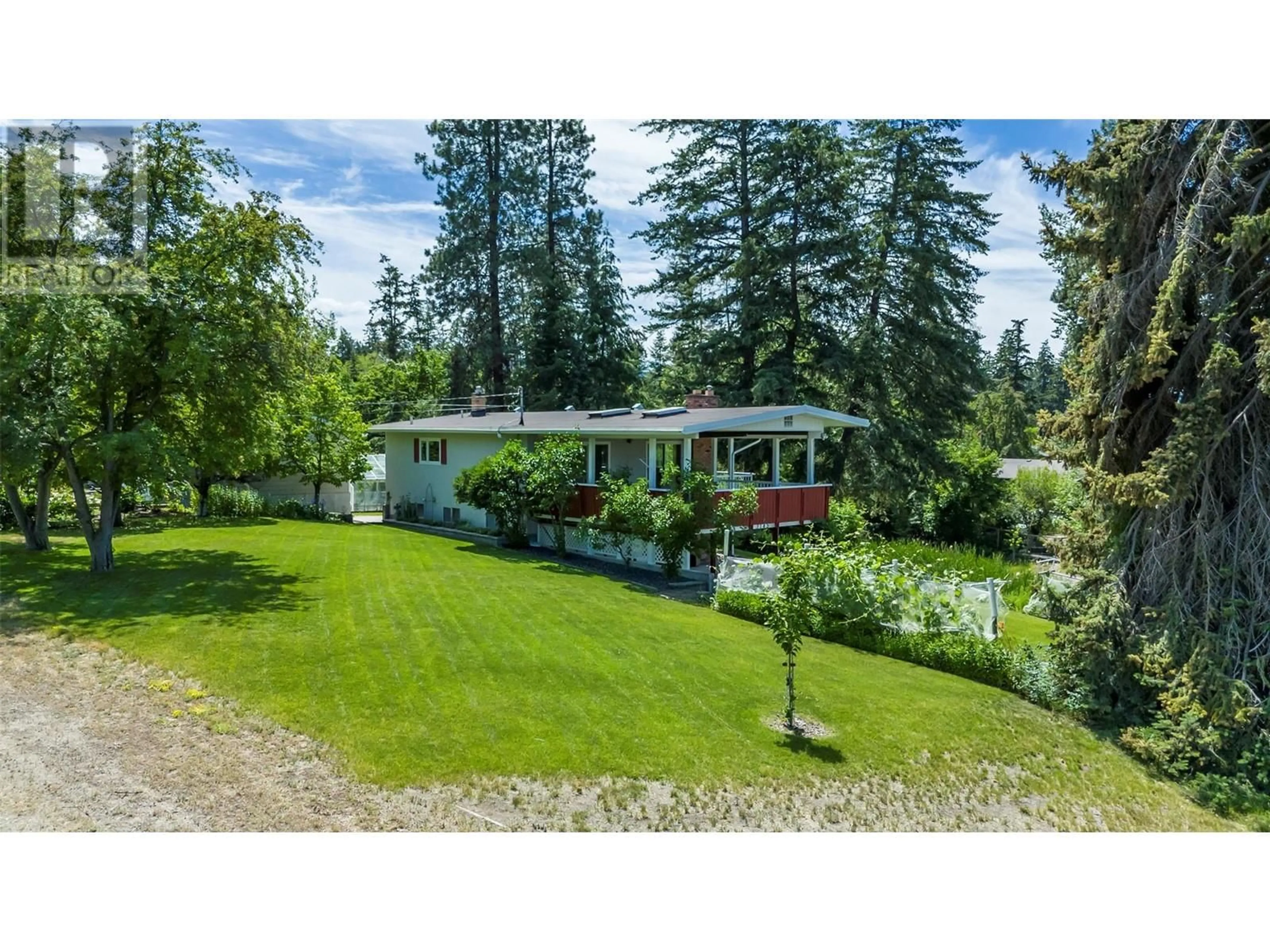 A pic from outside/outdoor area/front of a property/back of a property/a pic from drone, water/lake/river/ocean view for 3145 Hall Road, Kelowna British Columbia V1W2R8