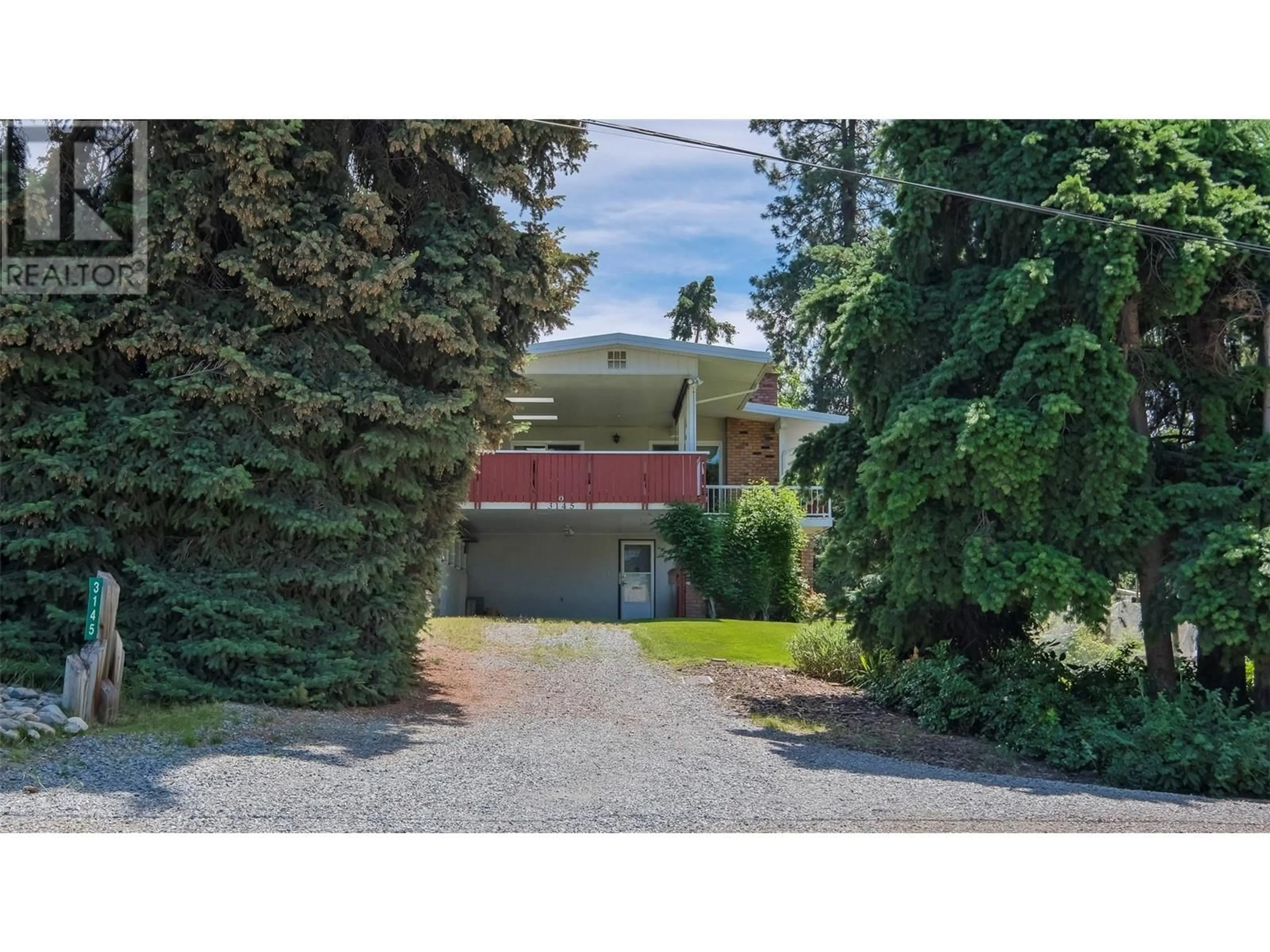 A pic from outside/outdoor area/front of a property/back of a property/a pic from drone, street for 3145 Hall Road, Kelowna British Columbia V1W2R8