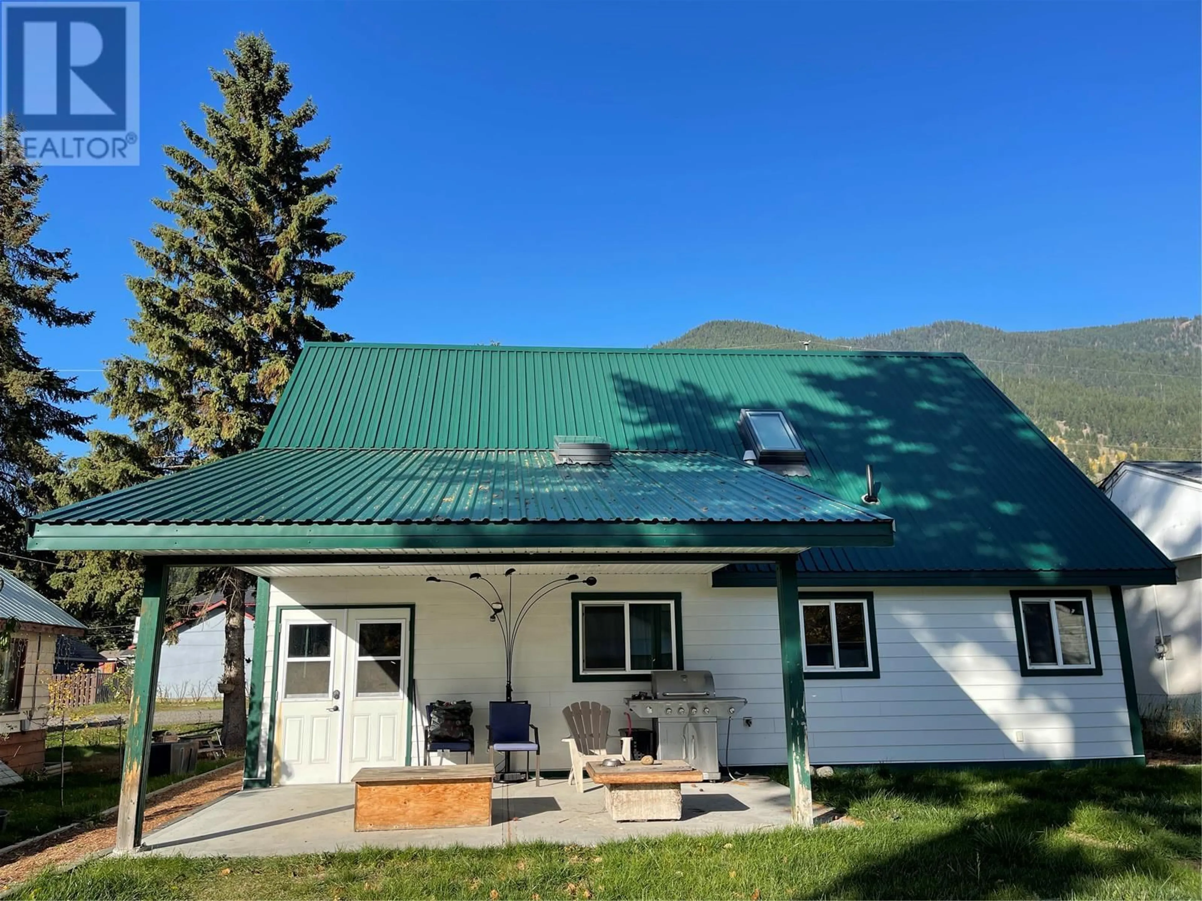 A pic from outside/outdoor area/front of a property/back of a property/a pic from drone, mountain view for 5763 Ponderosa Road, Falkland British Columbia V0E1W0