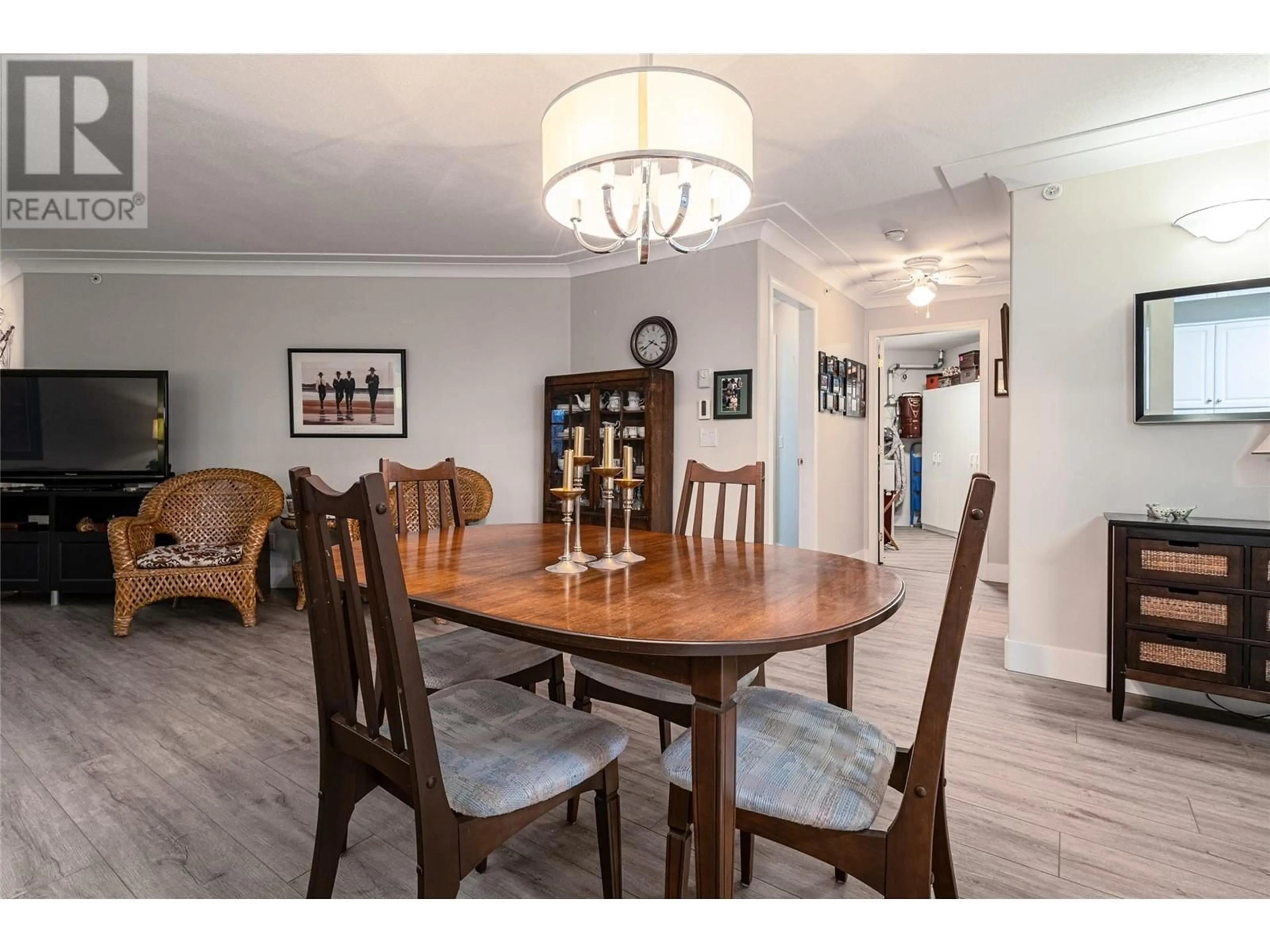 Dining room, wood/laminate floor for 1966 Enterprise Way Unit# 412, Kelowna British Columbia V1Y9S8