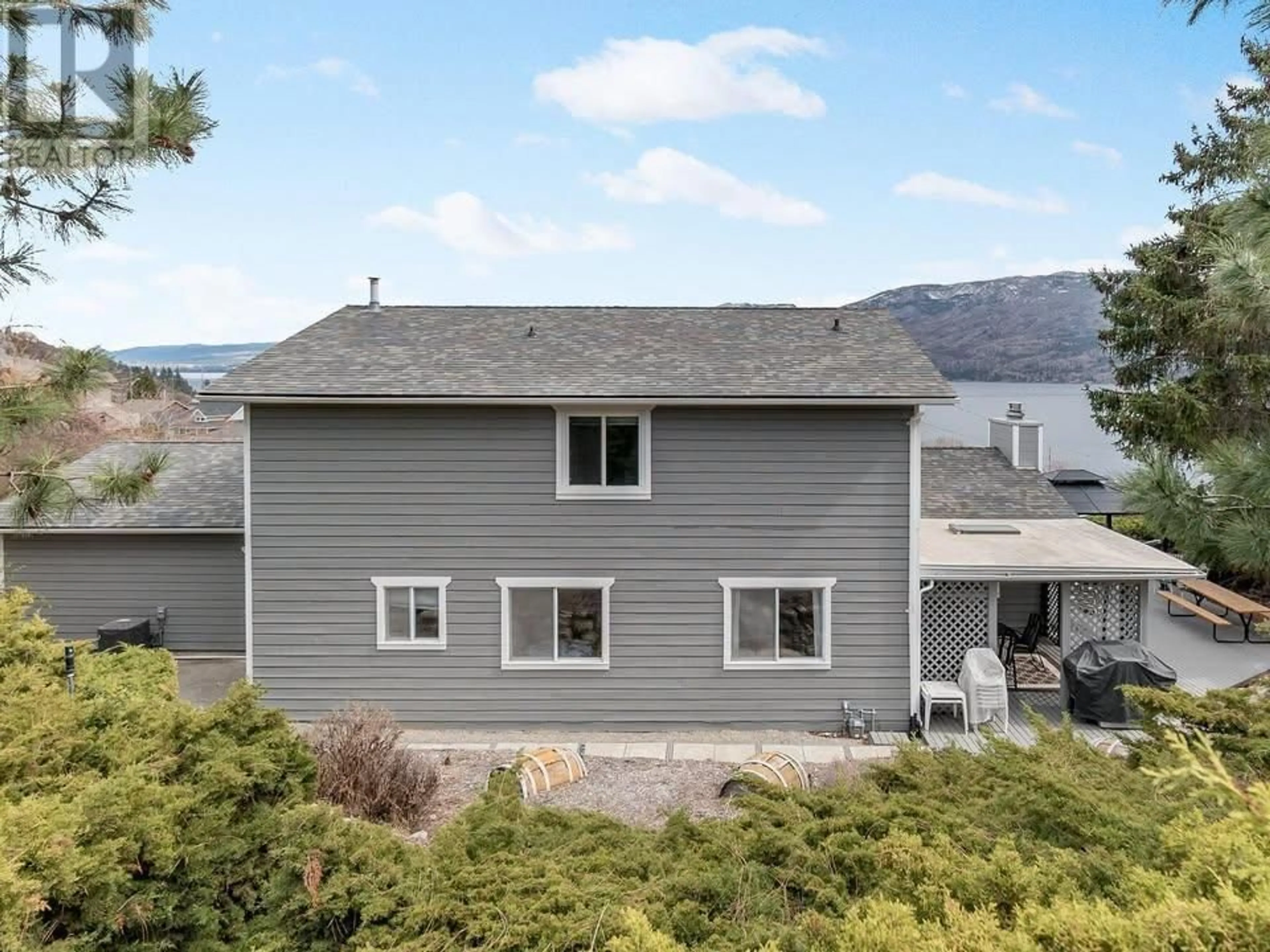 A pic from outside/outdoor area/front of a property/back of a property/a pic from drone, mountain view for 3745 Shaw Road, Peachland British Columbia V0H1X2