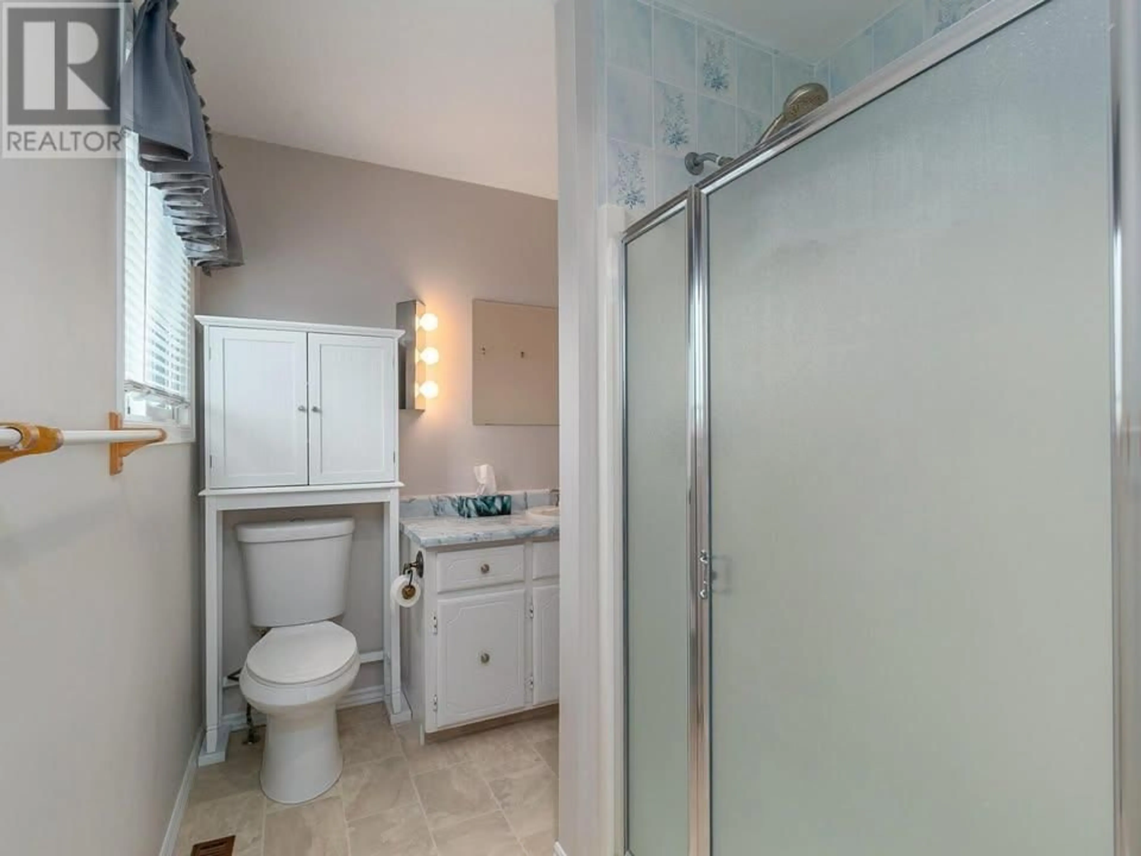 Standard bathroom, ceramic/tile floor for 3745 Shaw Road, Peachland British Columbia V0H1X2