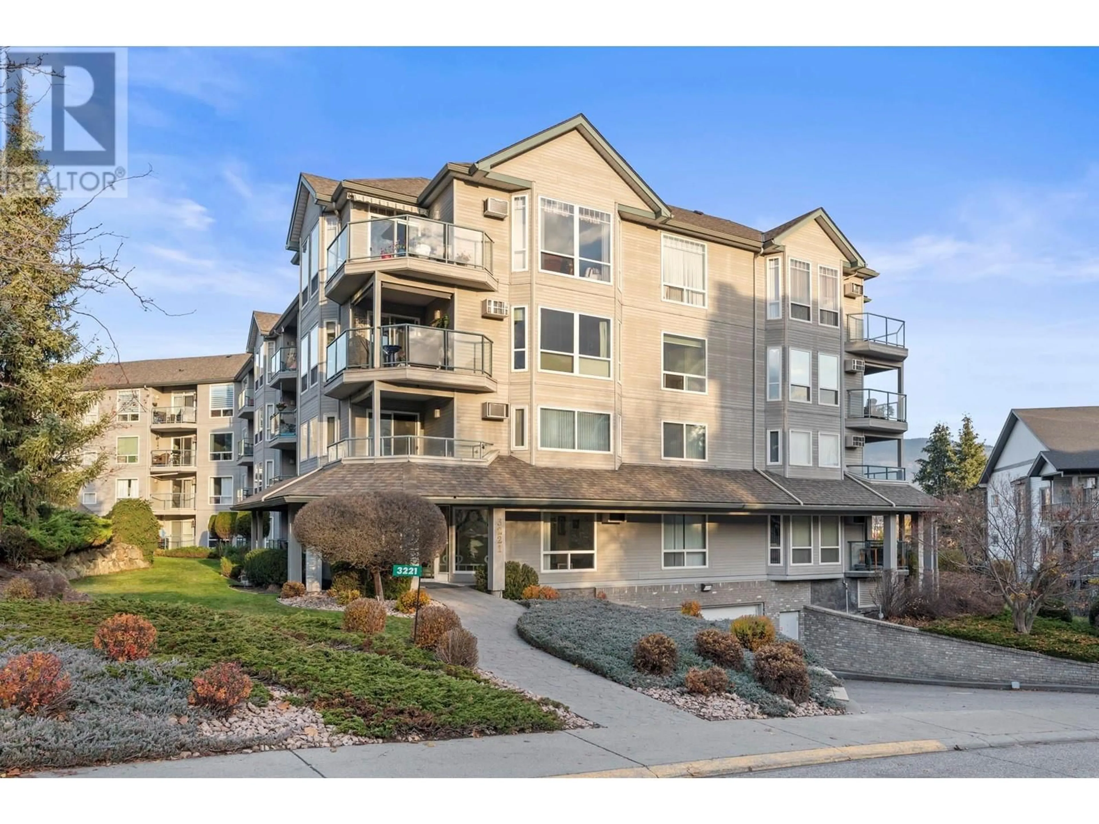 A pic from outside/outdoor area/front of a property/back of a property/a pic from drone, mountain view for 3221 Centennial Drive Unit# 203, Vernon British Columbia V1T2T8