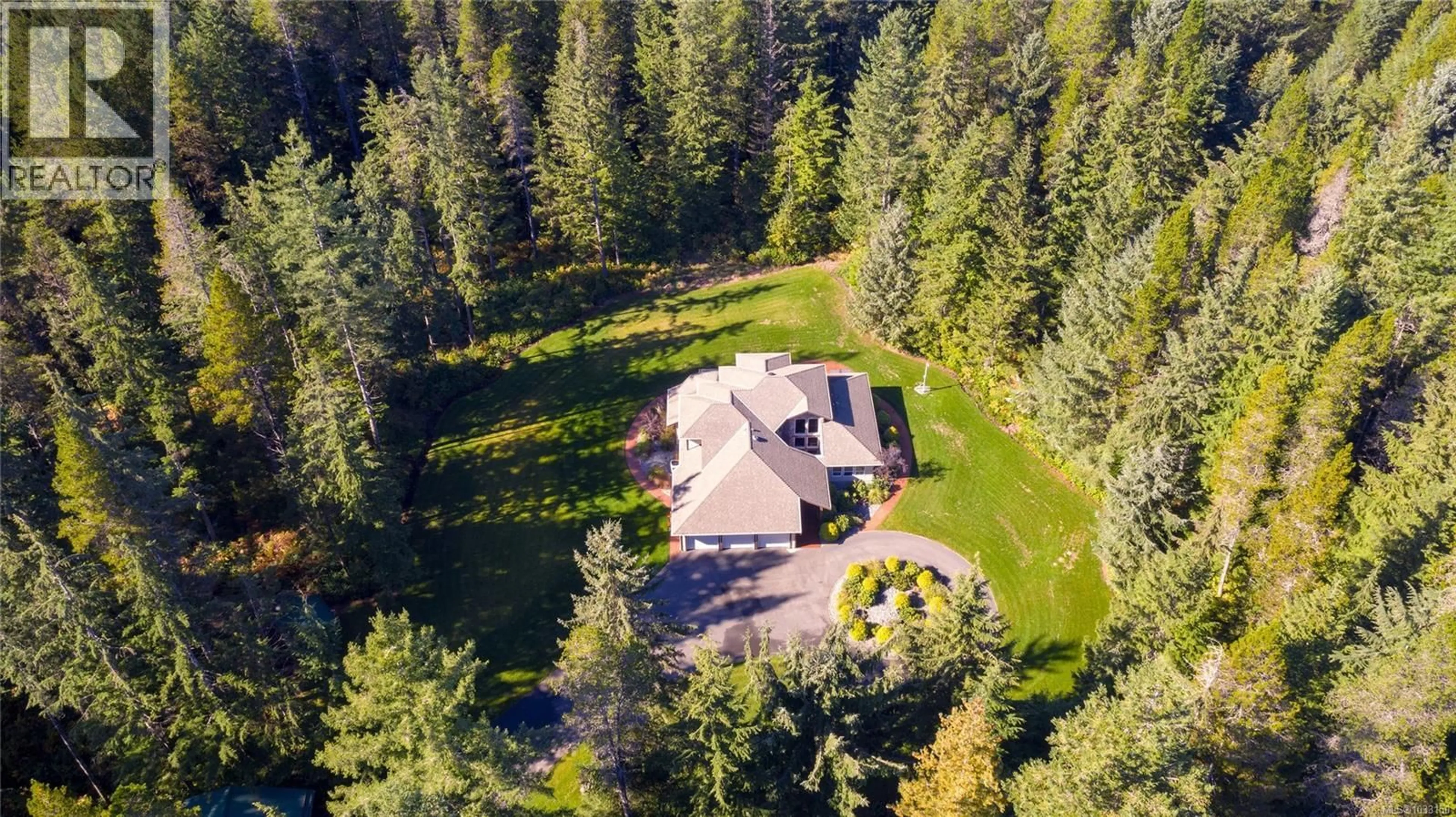 A pic from outside/outdoor area/front of a property/back of a property/a pic from drone, forest/trees view for 5165 DUNCAN BAY ROAD, Campbell River British Columbia V9H1N6