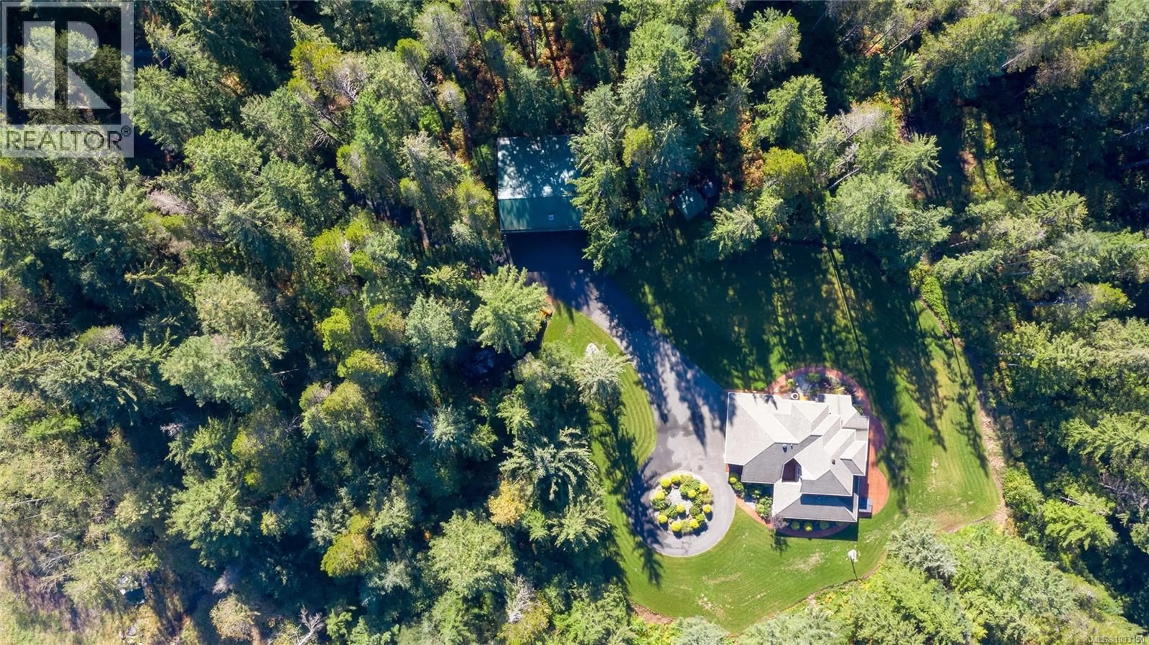 A pic from outside/outdoor area/front of a property/back of a property/a pic from drone, forest/trees view for 5165 DUNCAN BAY ROAD, Campbell River British Columbia V9H1N6