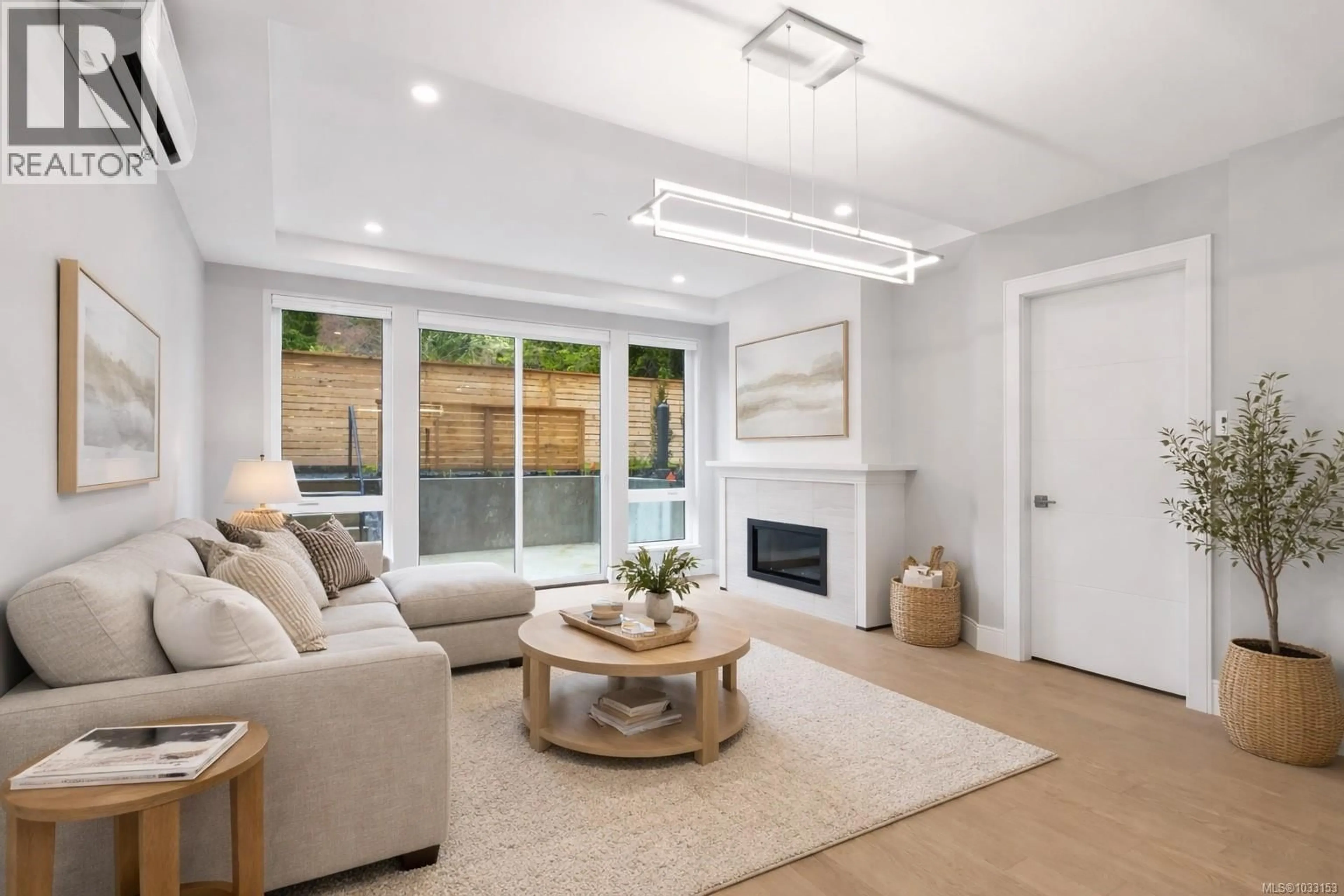 Living room with furniture, unknown for 103 - 990 DOUMAC AVENUE, Saanich British Columbia V8Y1M4