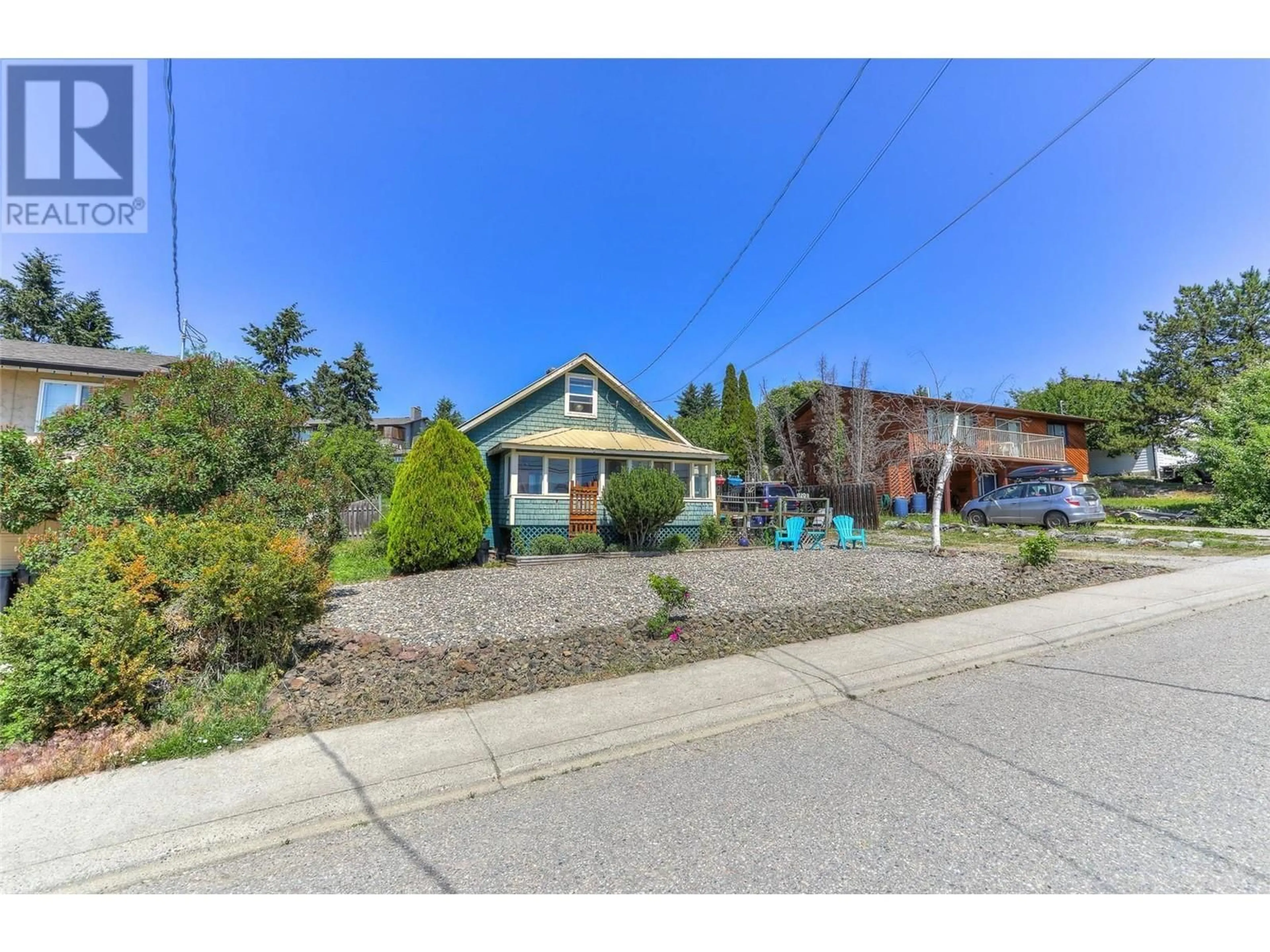 A pic from outside/outdoor area/front of a property/back of a property/a pic from drone, street for 1209 25 Avenue, Vernon British Columbia V1T7L5