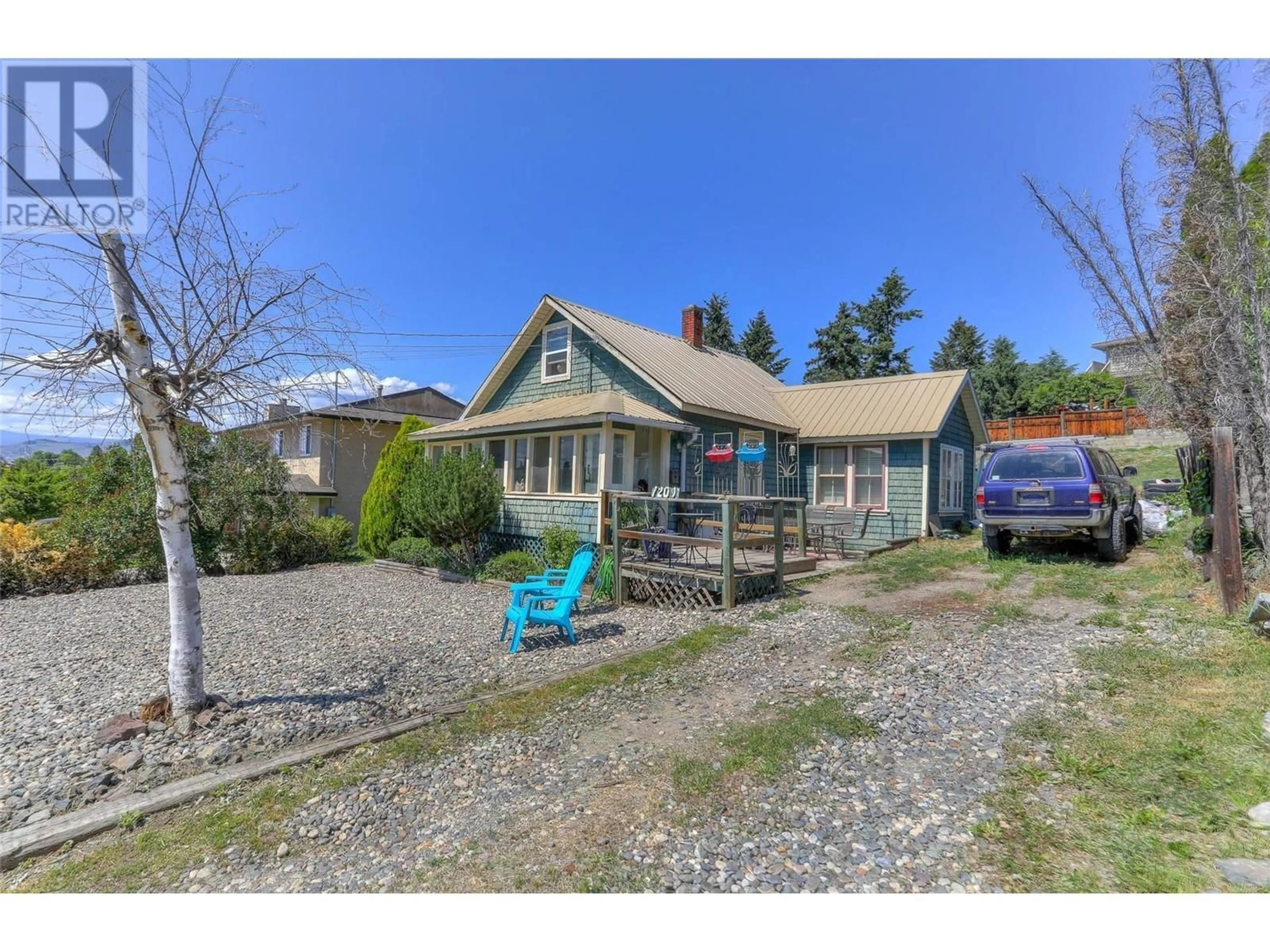 A pic from outside/outdoor area/front of a property/back of a property/a pic from drone, unknown for 1209 25 Avenue, Vernon British Columbia V1T7L5