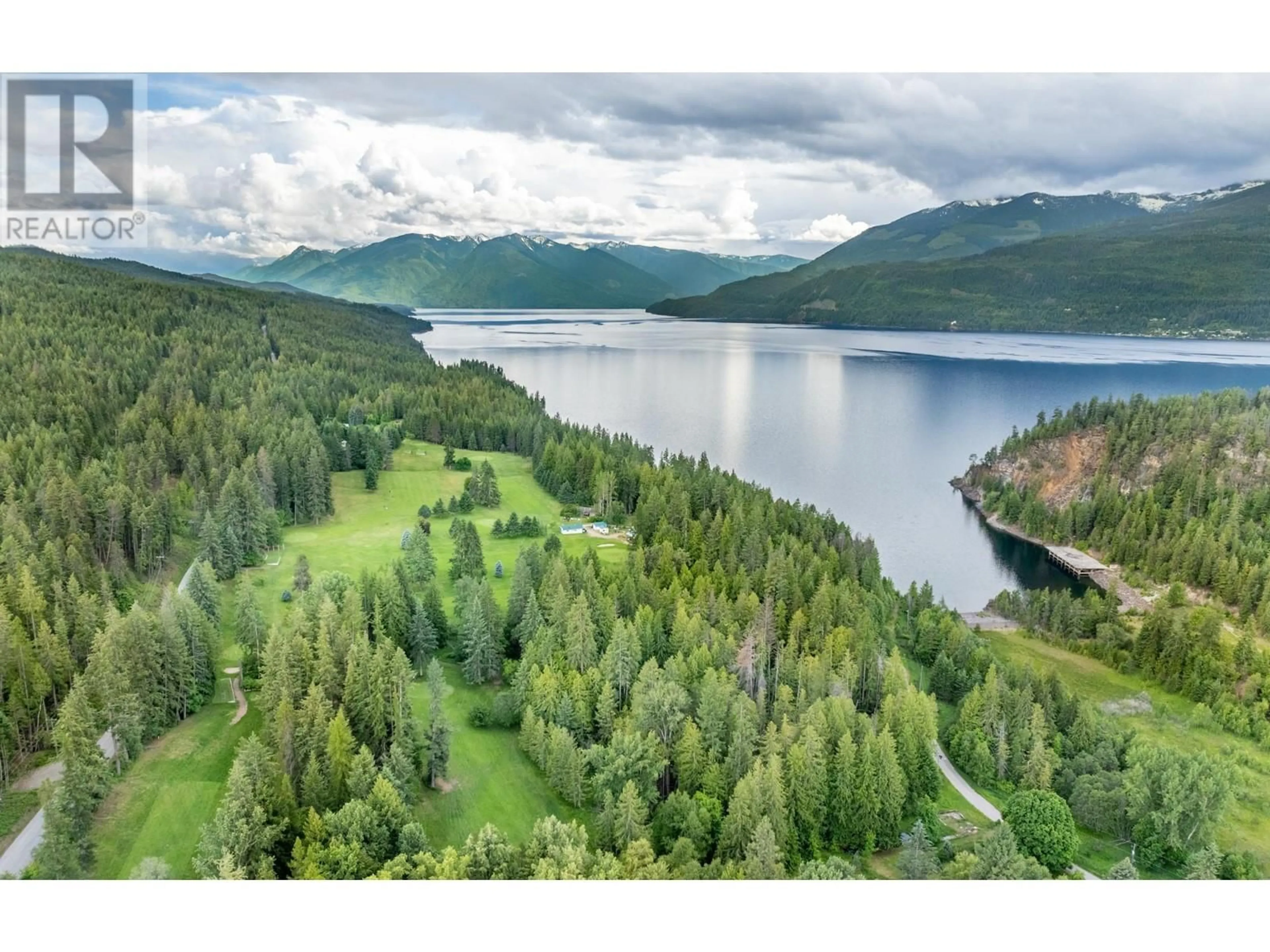 A pic from outside/outdoor area/front of a property/back of a property/a pic from drone, water/lake/river/ocean view for 1521 Hearst Avenue, Riondel British Columbia V0B2B0