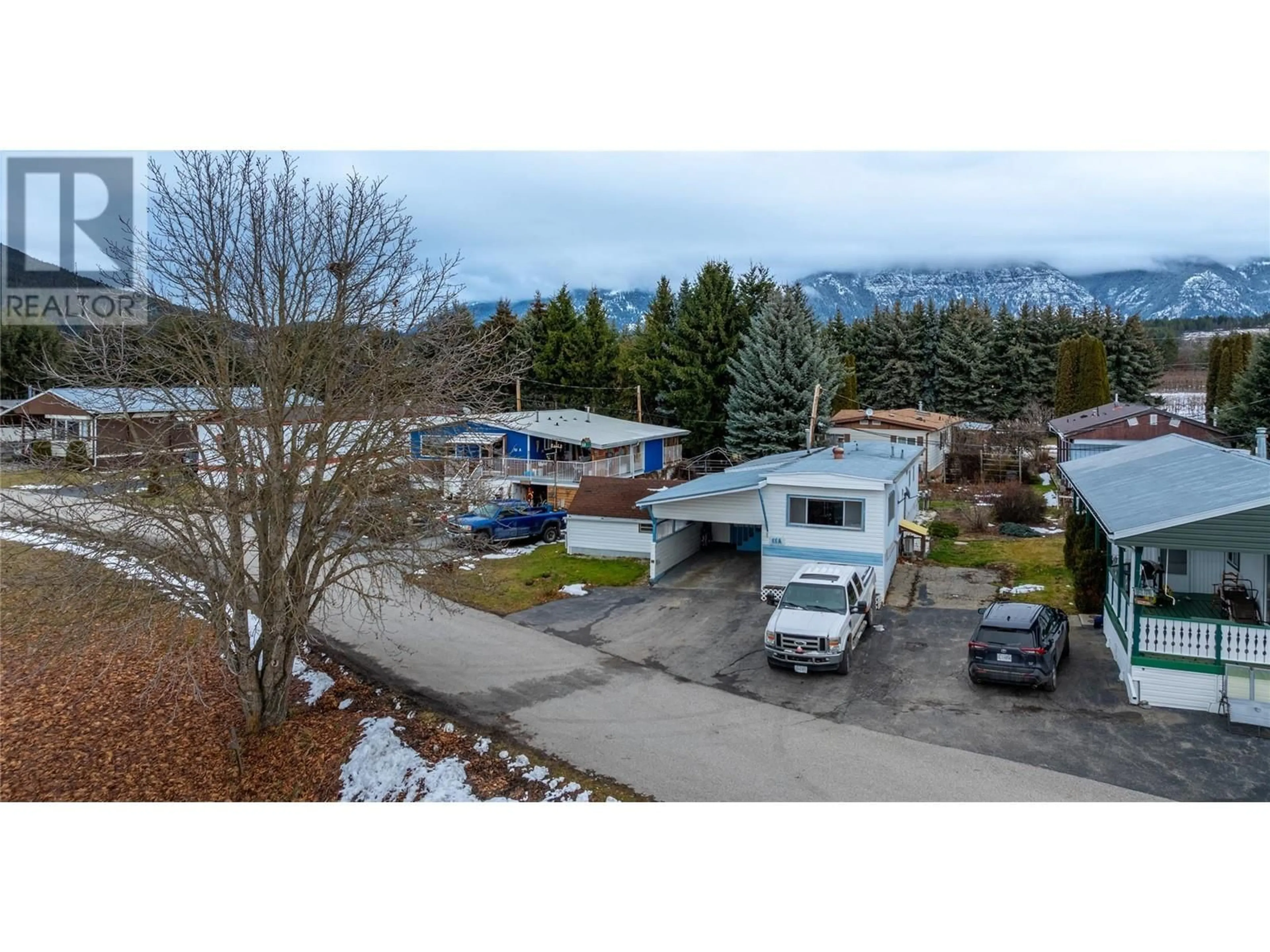 A pic from outside/outdoor area/front of a property/back of a property/a pic from drone, mountain view for 1909 Erickson Road Unit# 11A, Erickson British Columbia V0B1G1