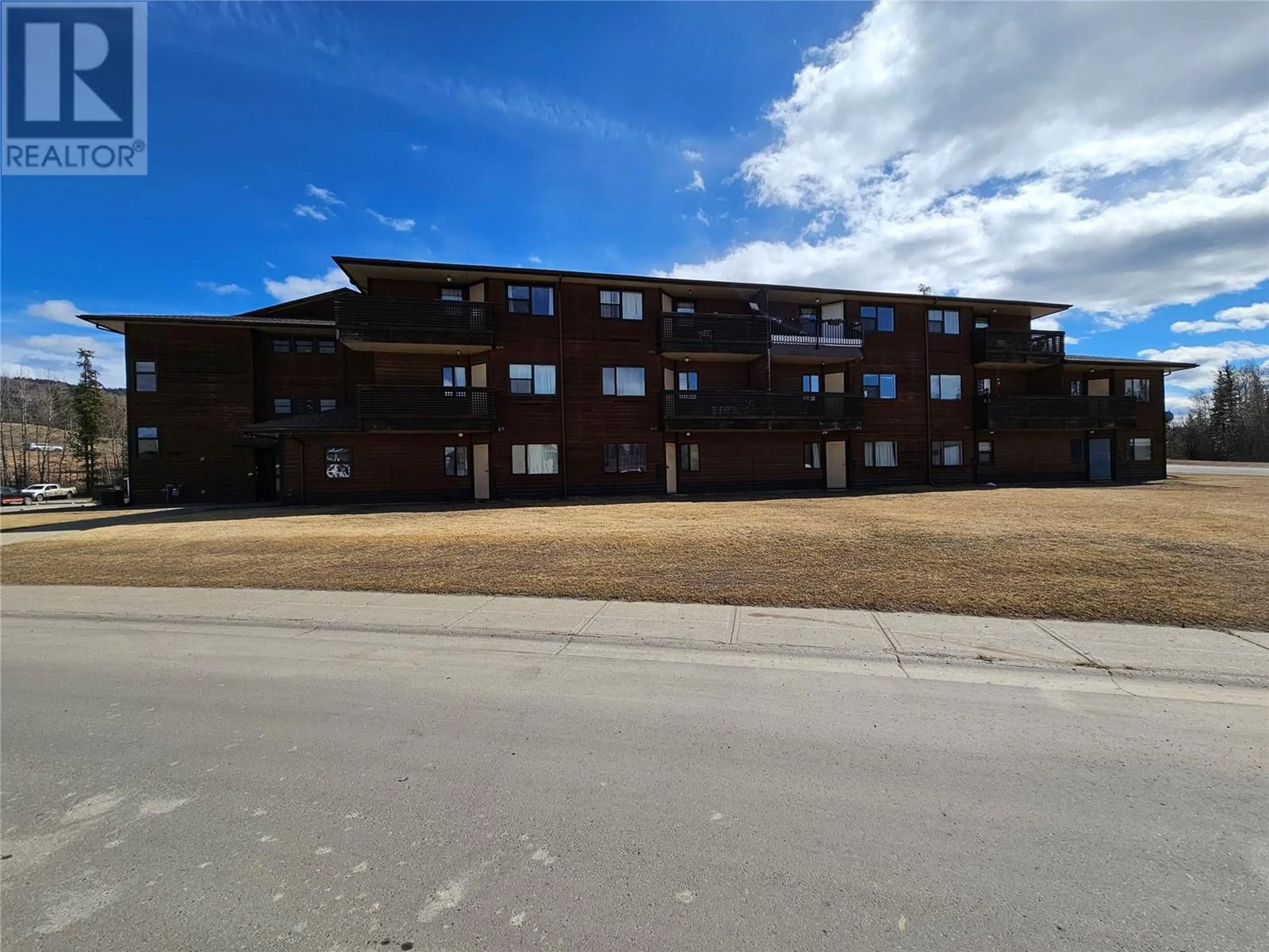 A pic from outside/outdoor area/front of a property/back of a property/a pic from drone, building for 115 195 Chamberlain Crescent, Tumbler Ridge British Columbia V0C2W0