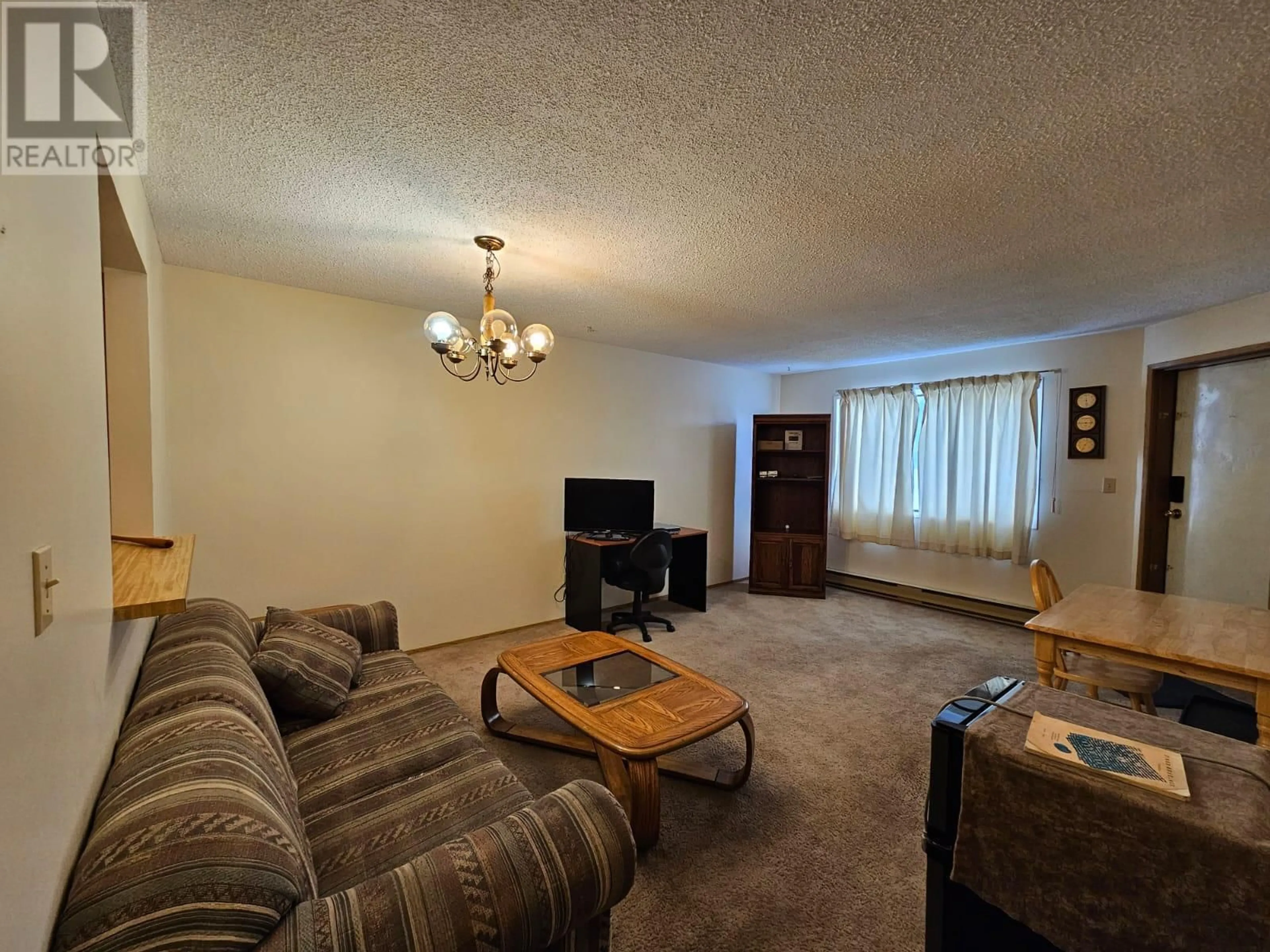 Living room with furniture, carpet floor for 115 195 Chamberlain Crescent, Tumbler Ridge British Columbia V0C2W0